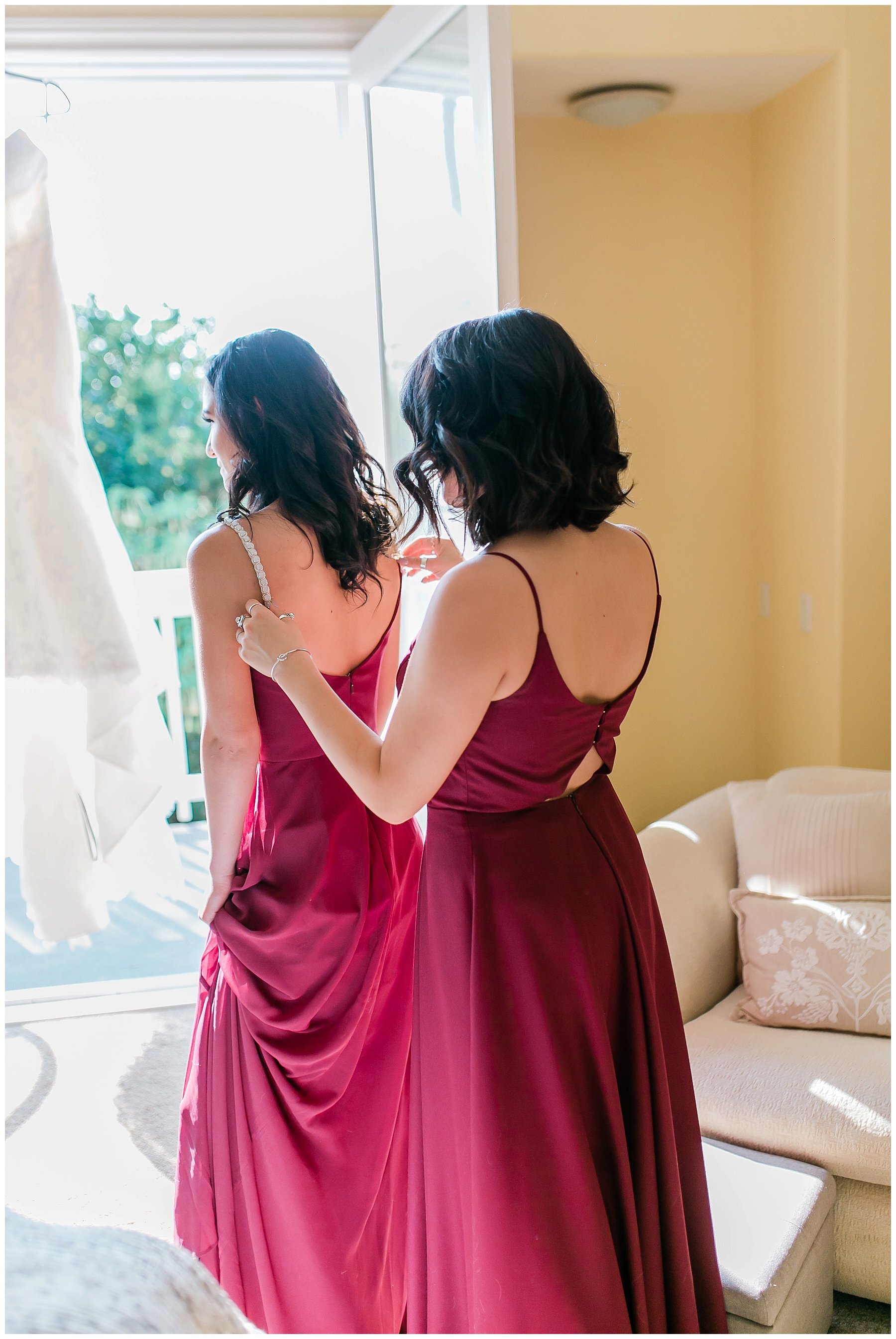  bridesmaids getting dressed in the bridal suite 