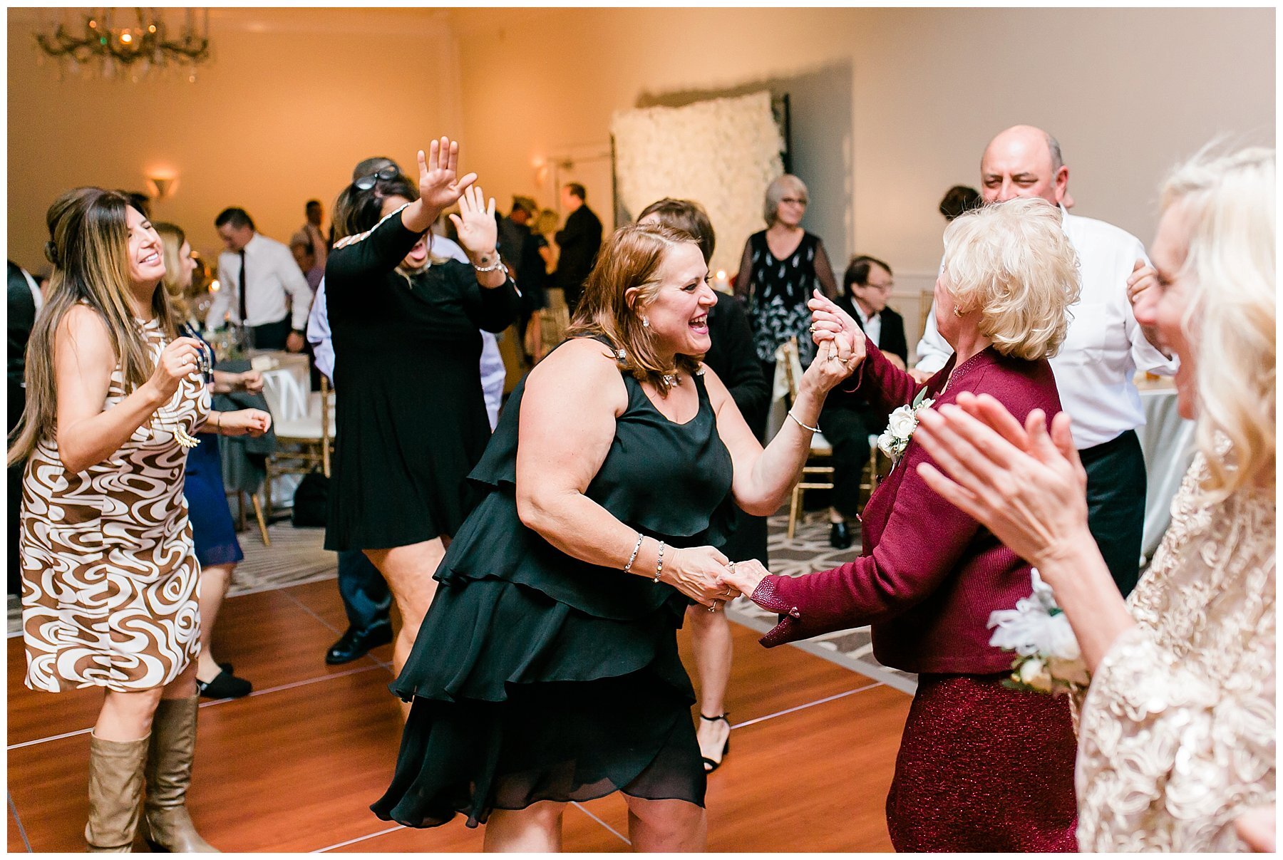  guests dancing at the reception  