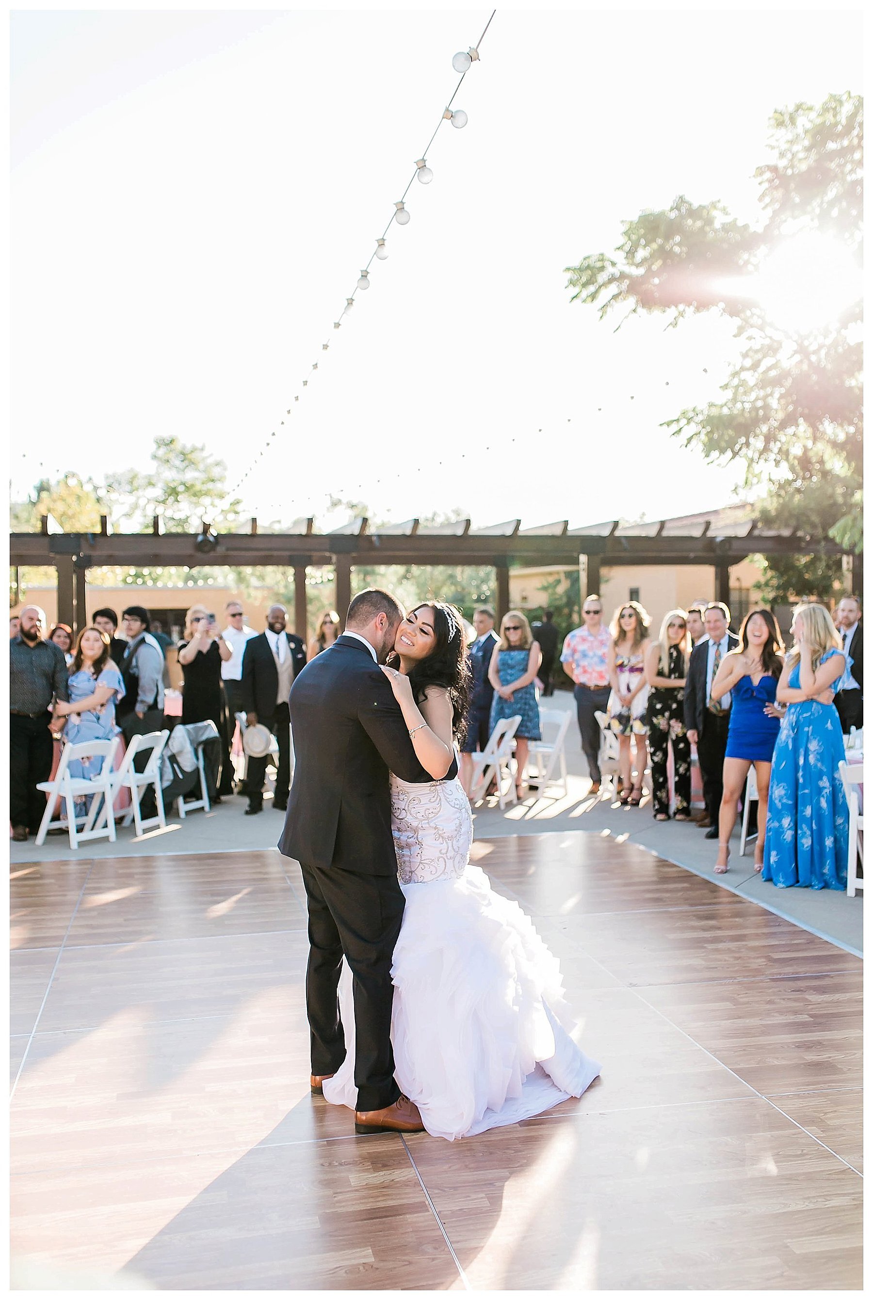  bride and groom sharing their first dance 
