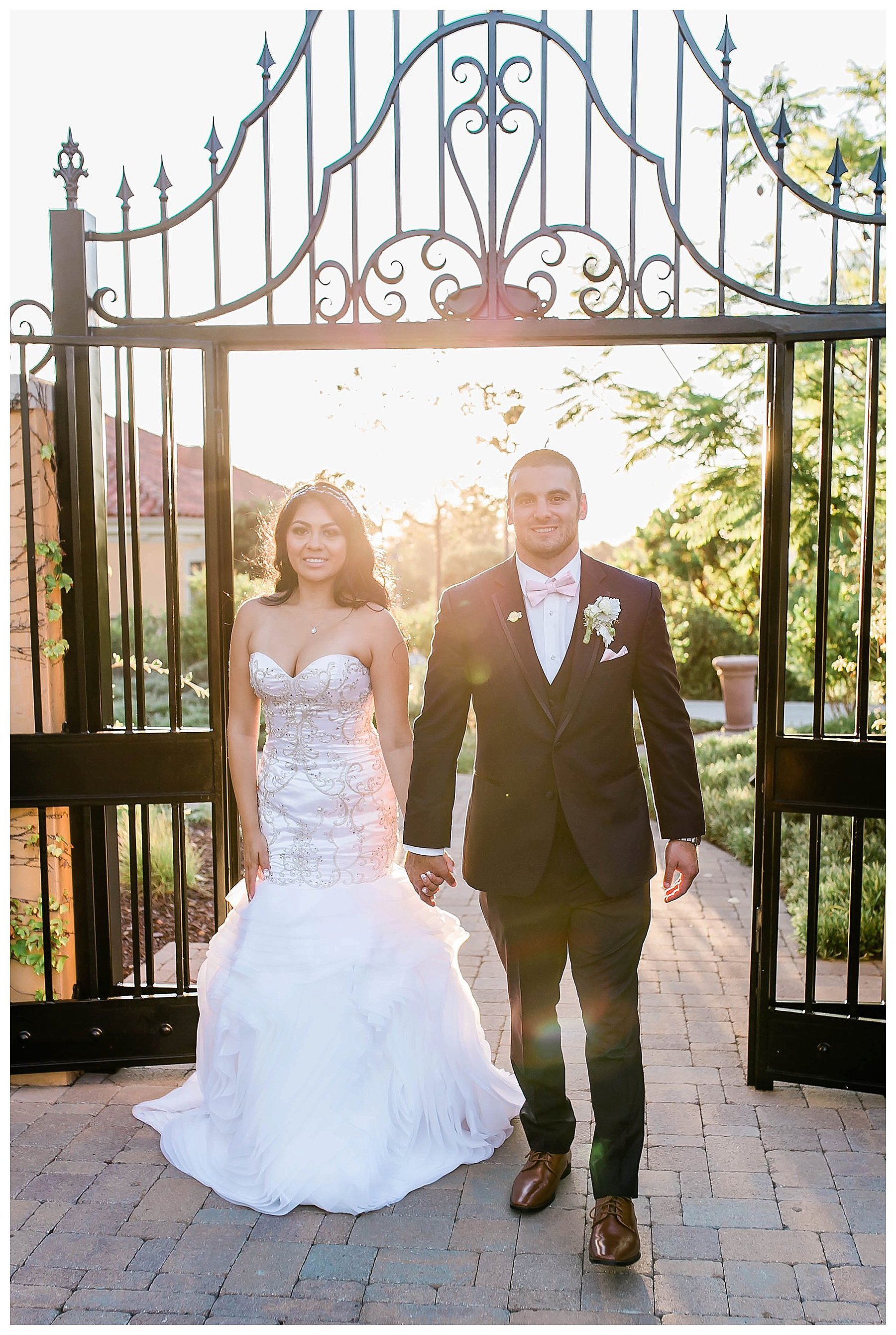  bride and groom in the doorway of the venue entrance 