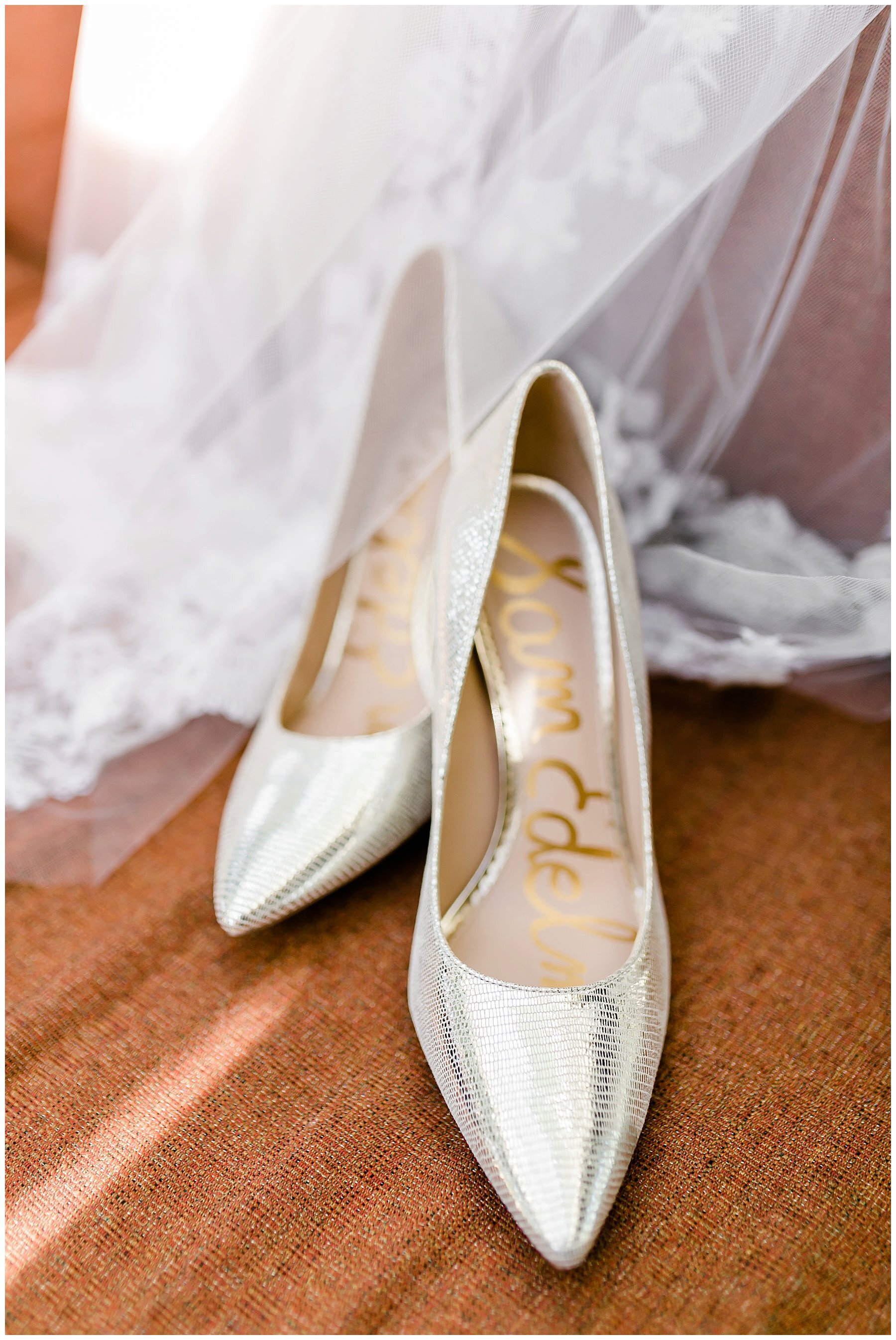  bride’s heels on bride’s veil 
