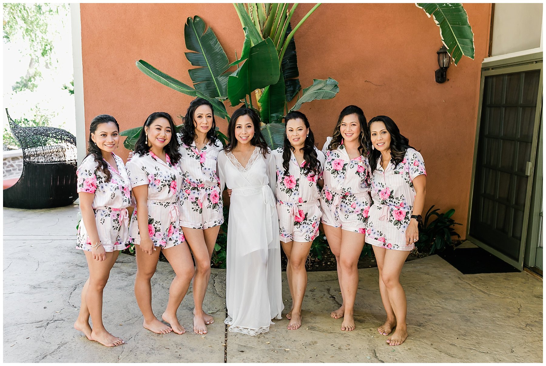  bridal party in robes outside 