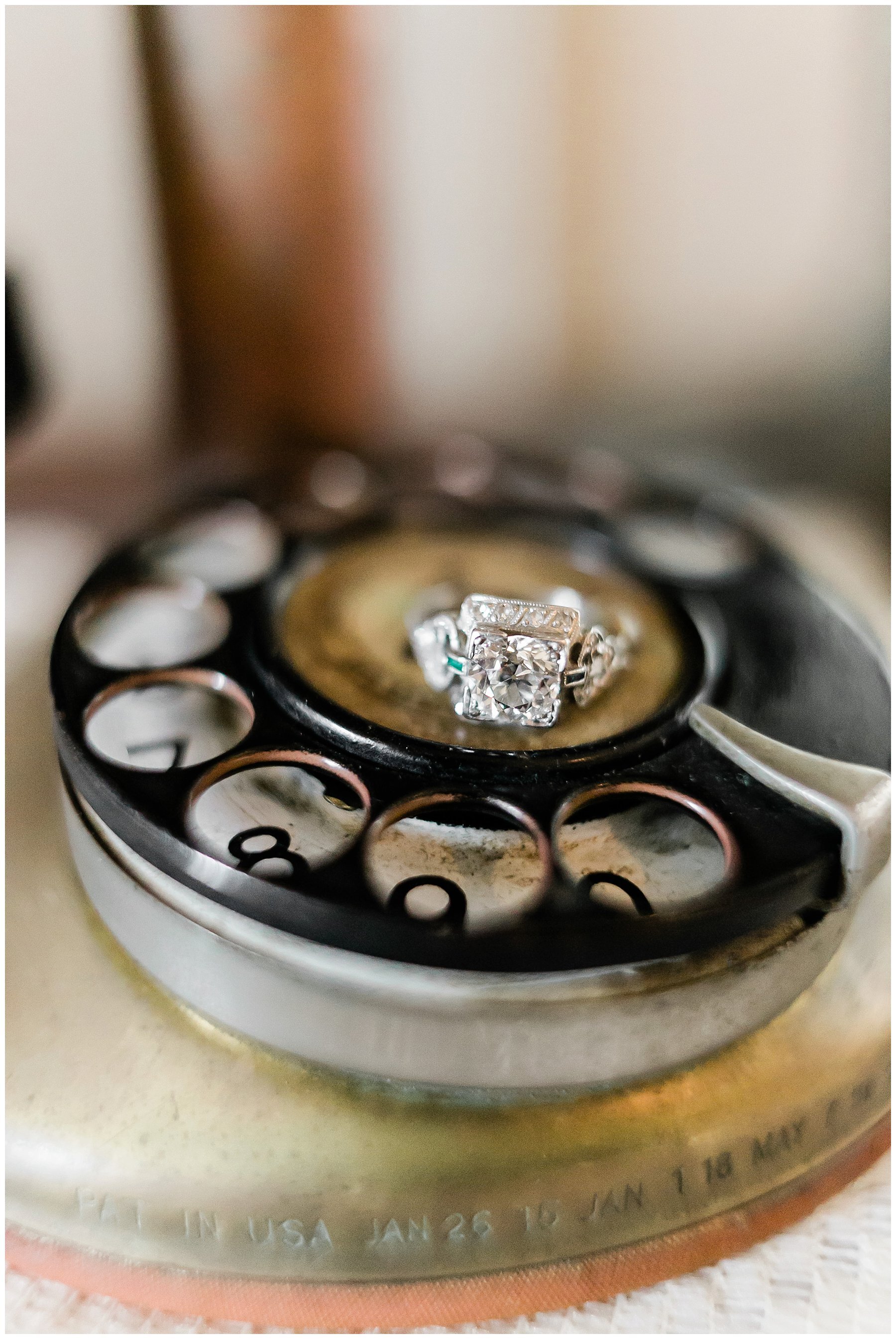  wedding bands on a rotary phone 