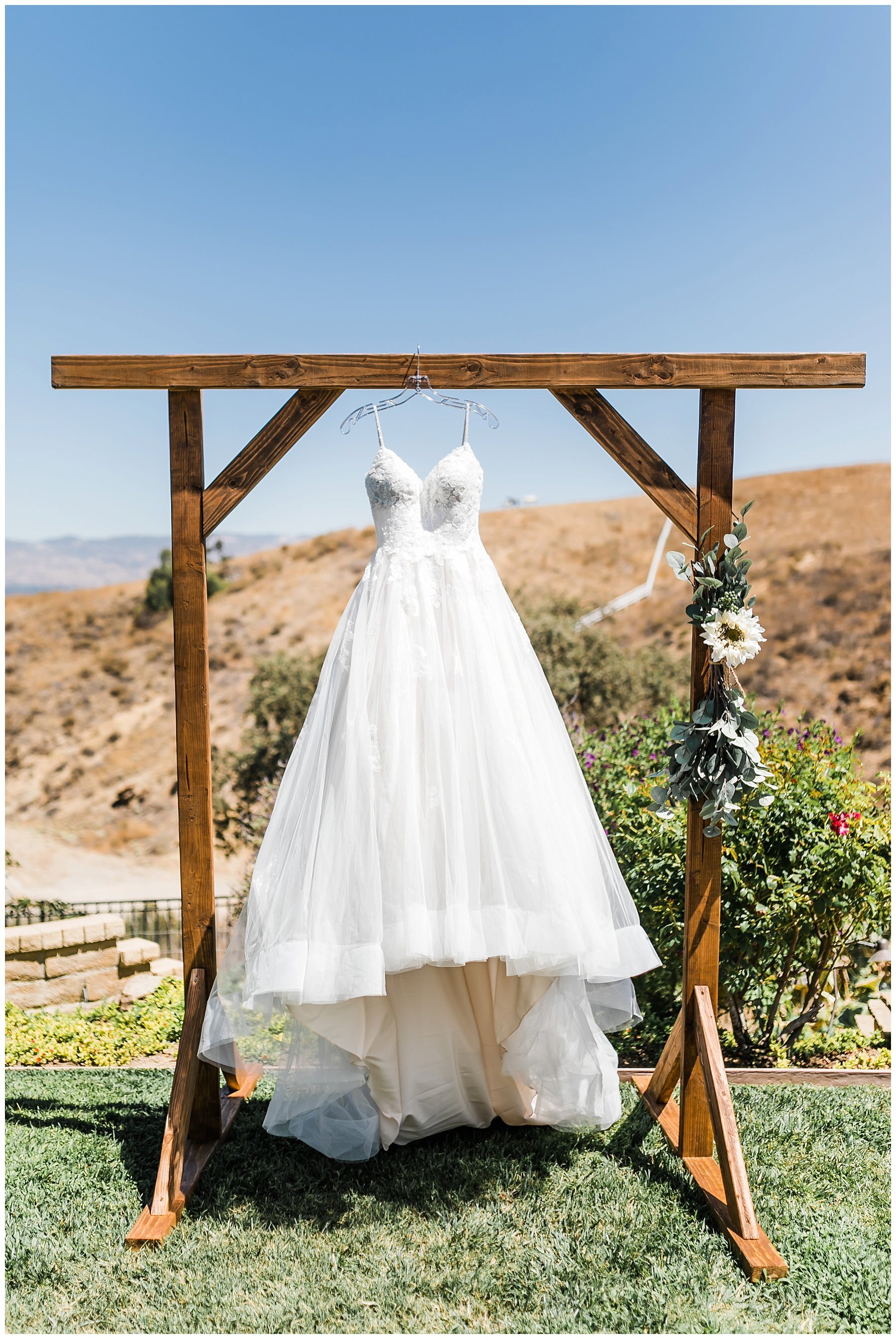  gown hanging on the wooden altar 