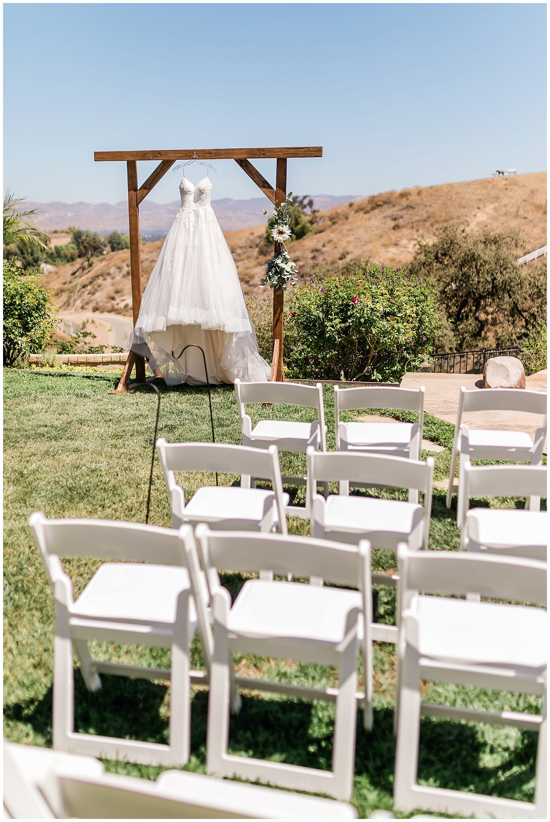  gown hanging on the wooden altar 