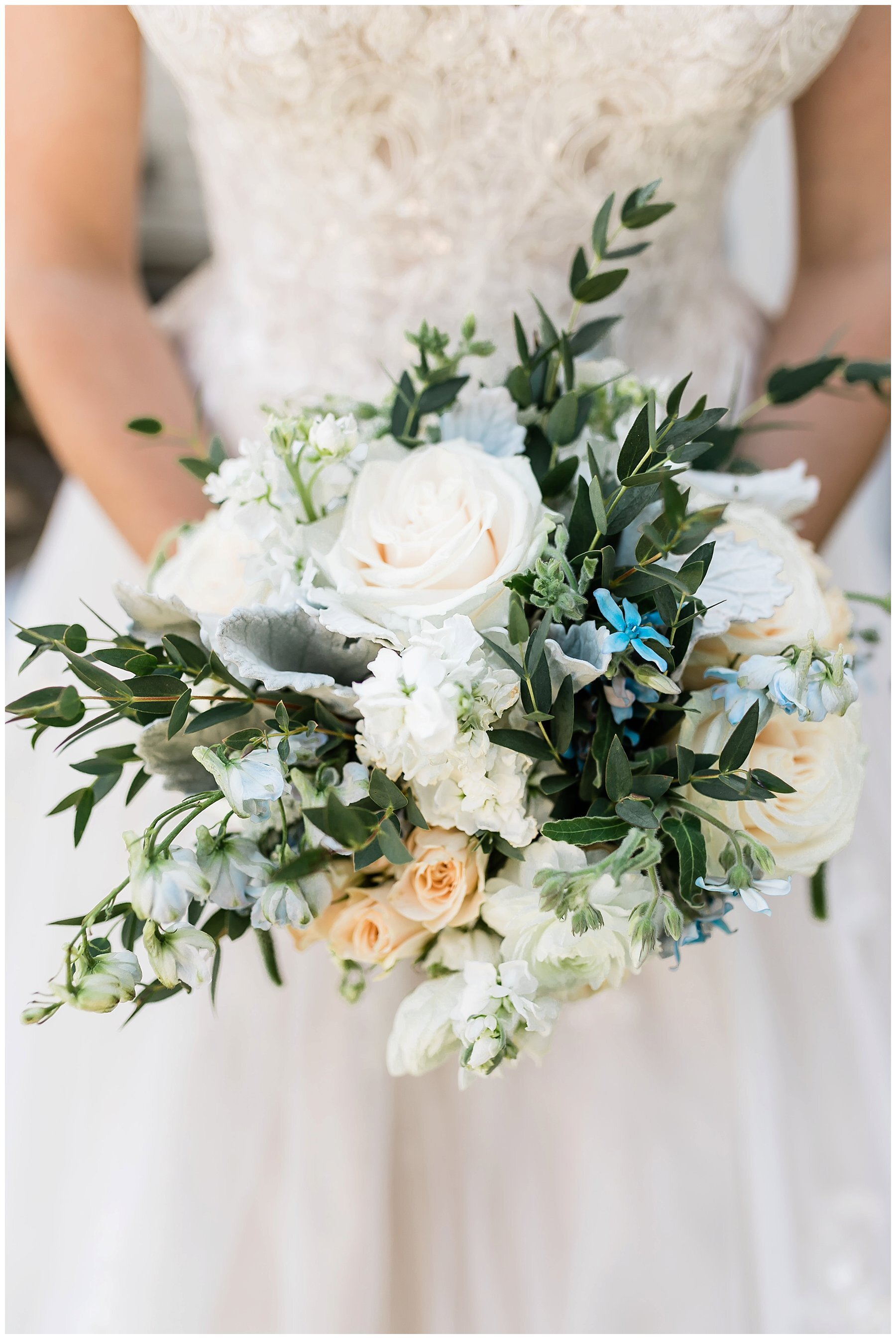  bride holding the bouquet in front of her waist 