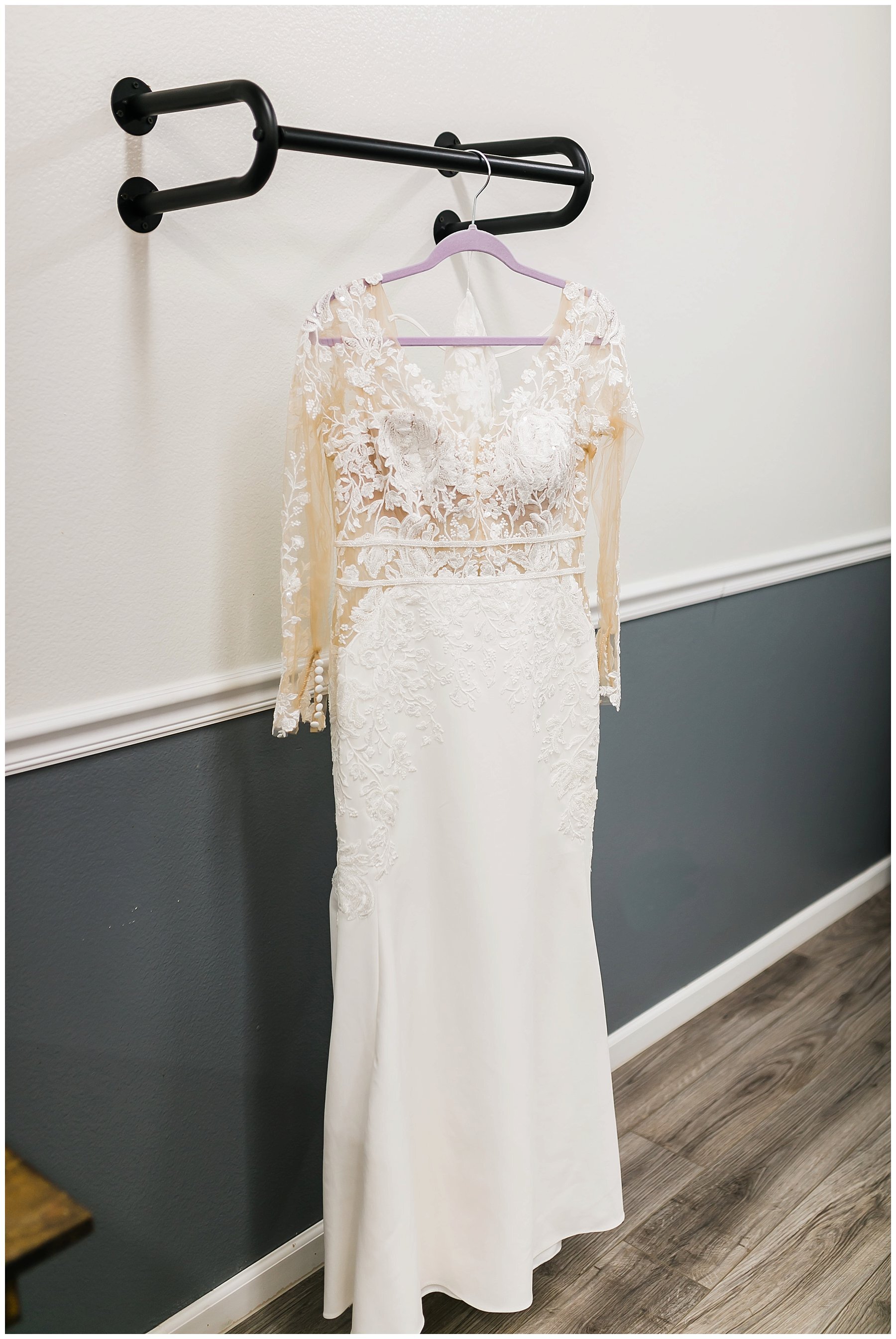  bride’s wedding dress hanging 
