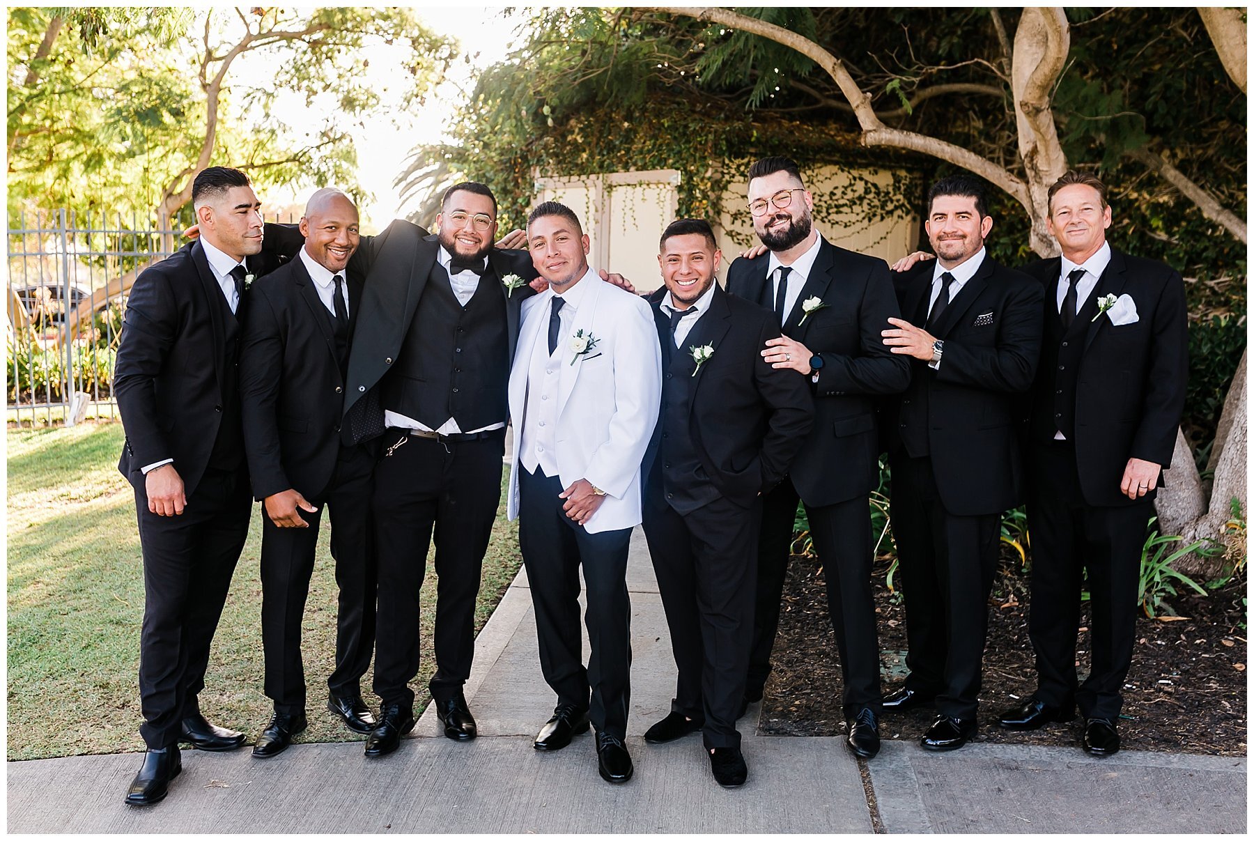  groomsmen standing together outside sterling hills 