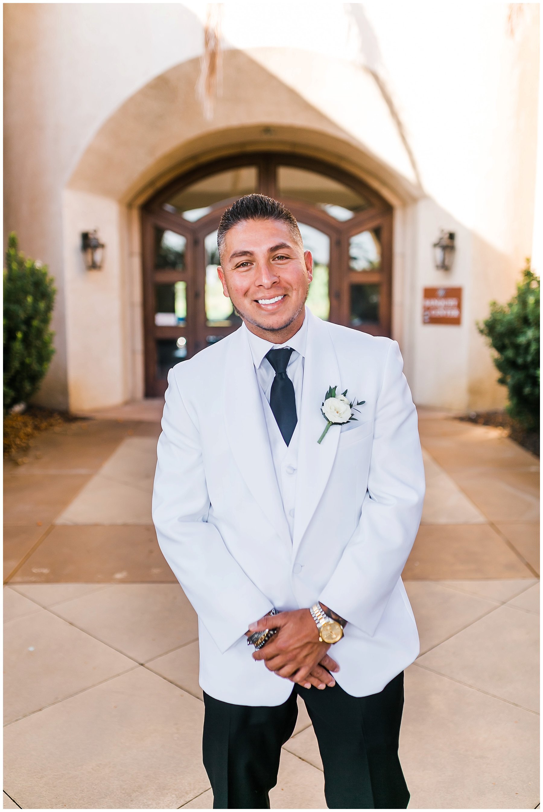  groom in front of the sterling hills venue 