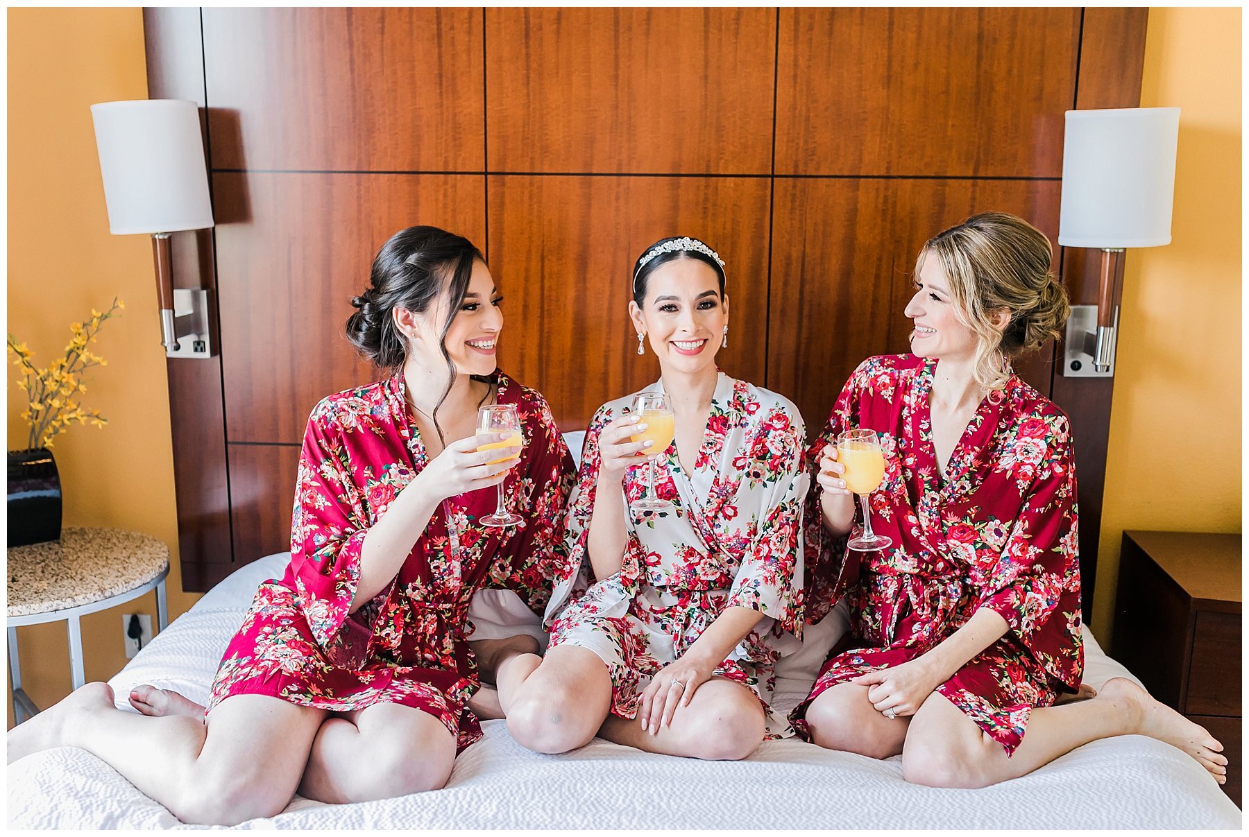  bride and bridesmaids in their robes in the bridal suite 