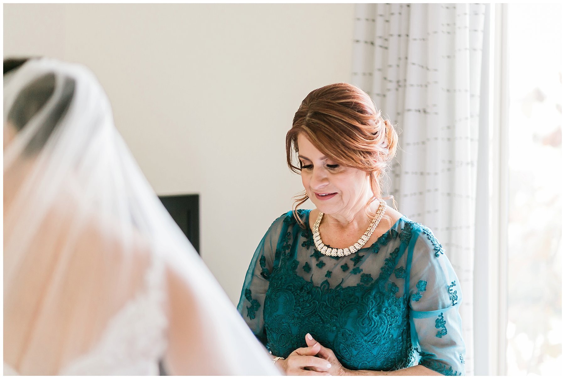  mother of the bride seeing her daughter get ready 