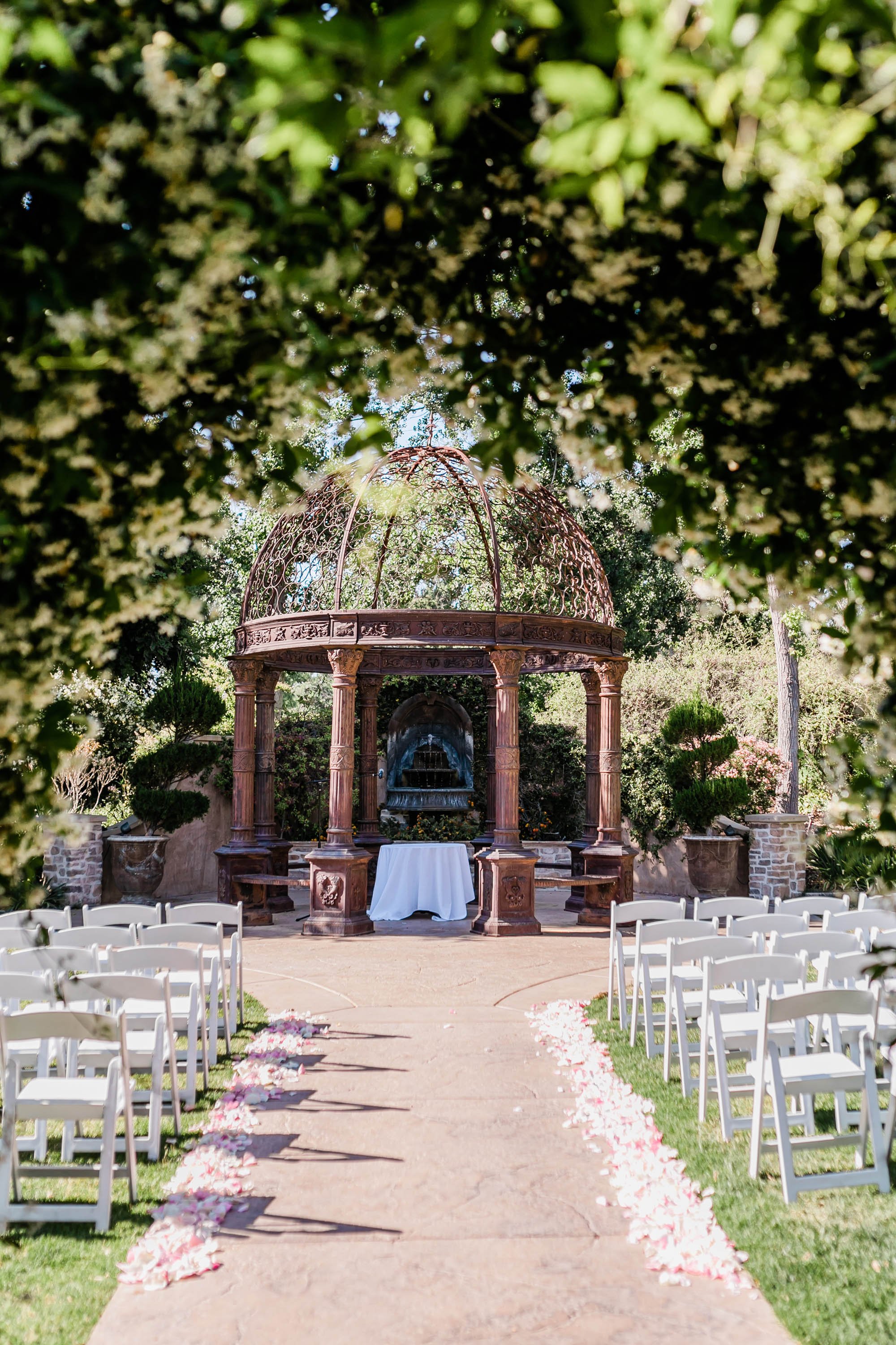 Tuscan garden ceremony site at Westlake Village Inn wedding in Westlake Village, CA. 