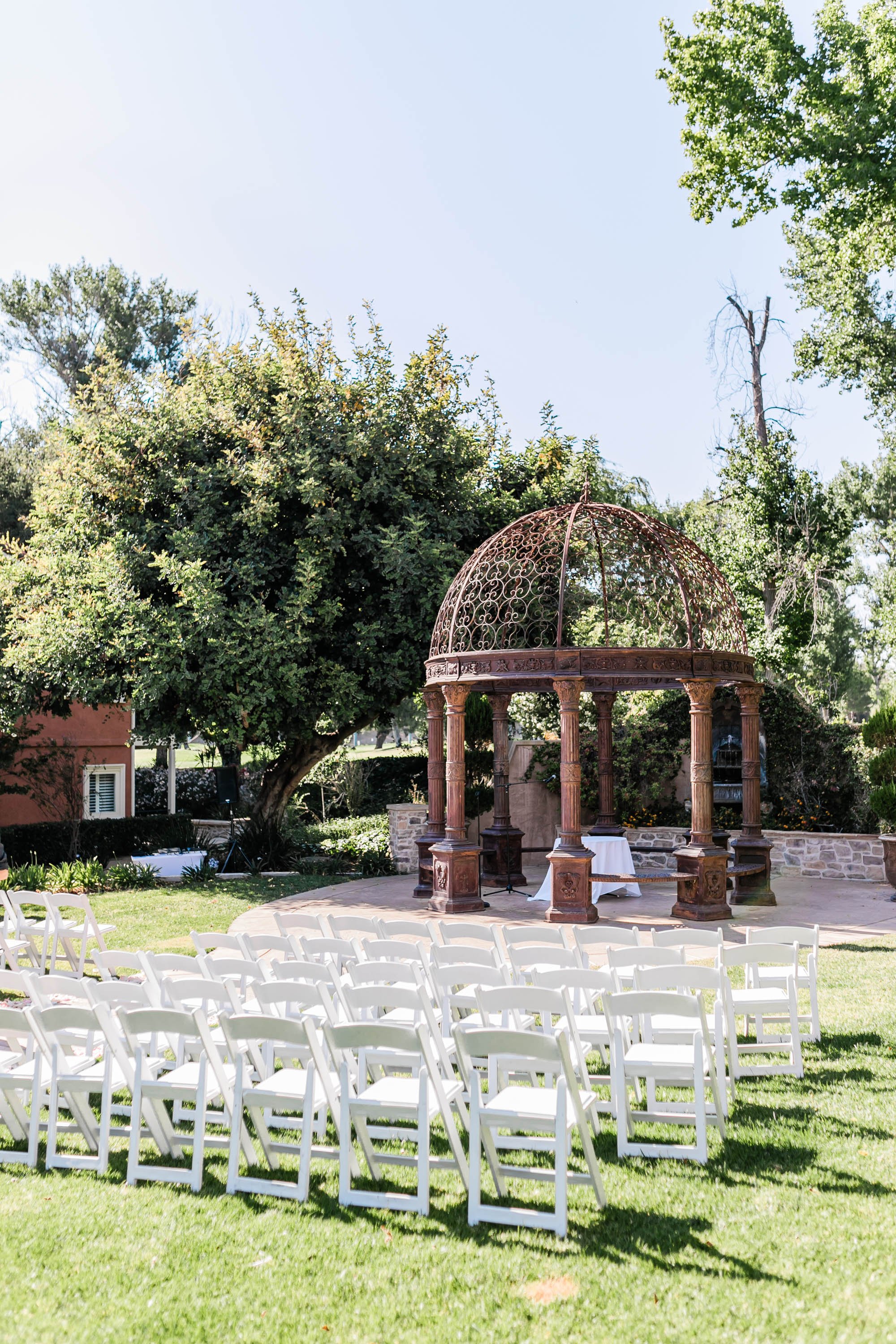 Tuscan garden ceremony site at Westlake Village Inn wedding in Westlake Village, CA.