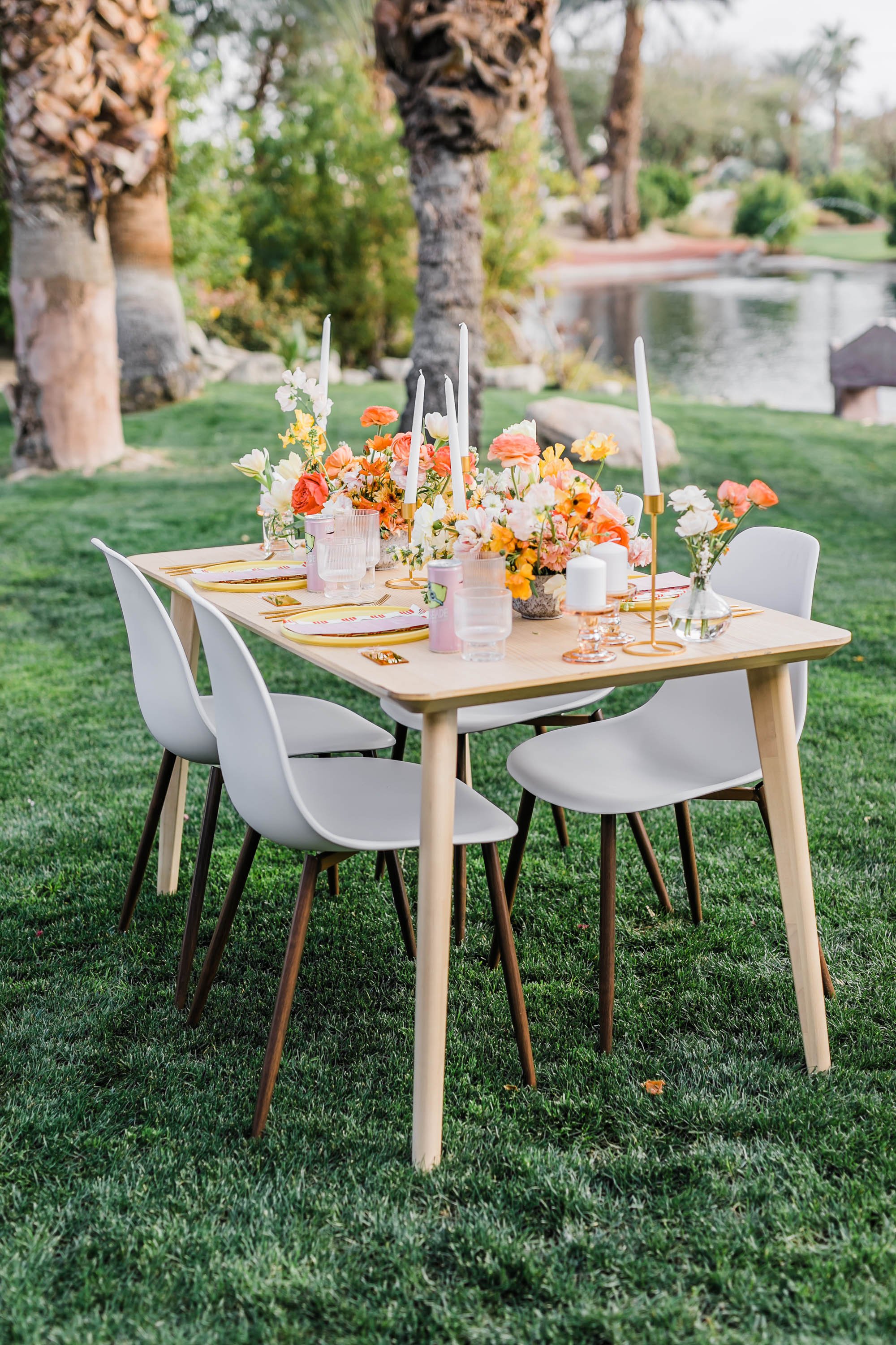 Bright sunny reception flowers and wedding decor at Palm Springs wedding elopement at Bougainvillea Estate.