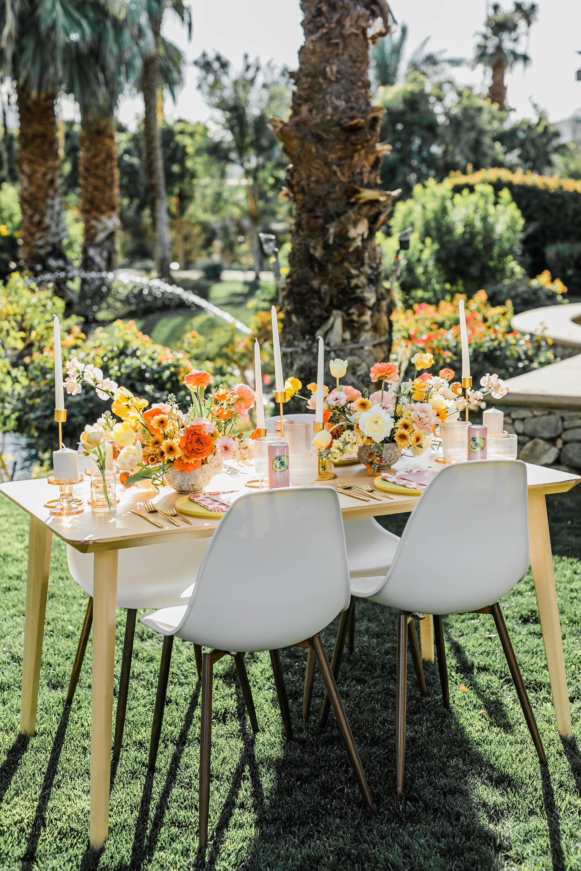 Retro, bright, sunny, reception table scape at Palm Springs wedding location Bougainvillea Estate.