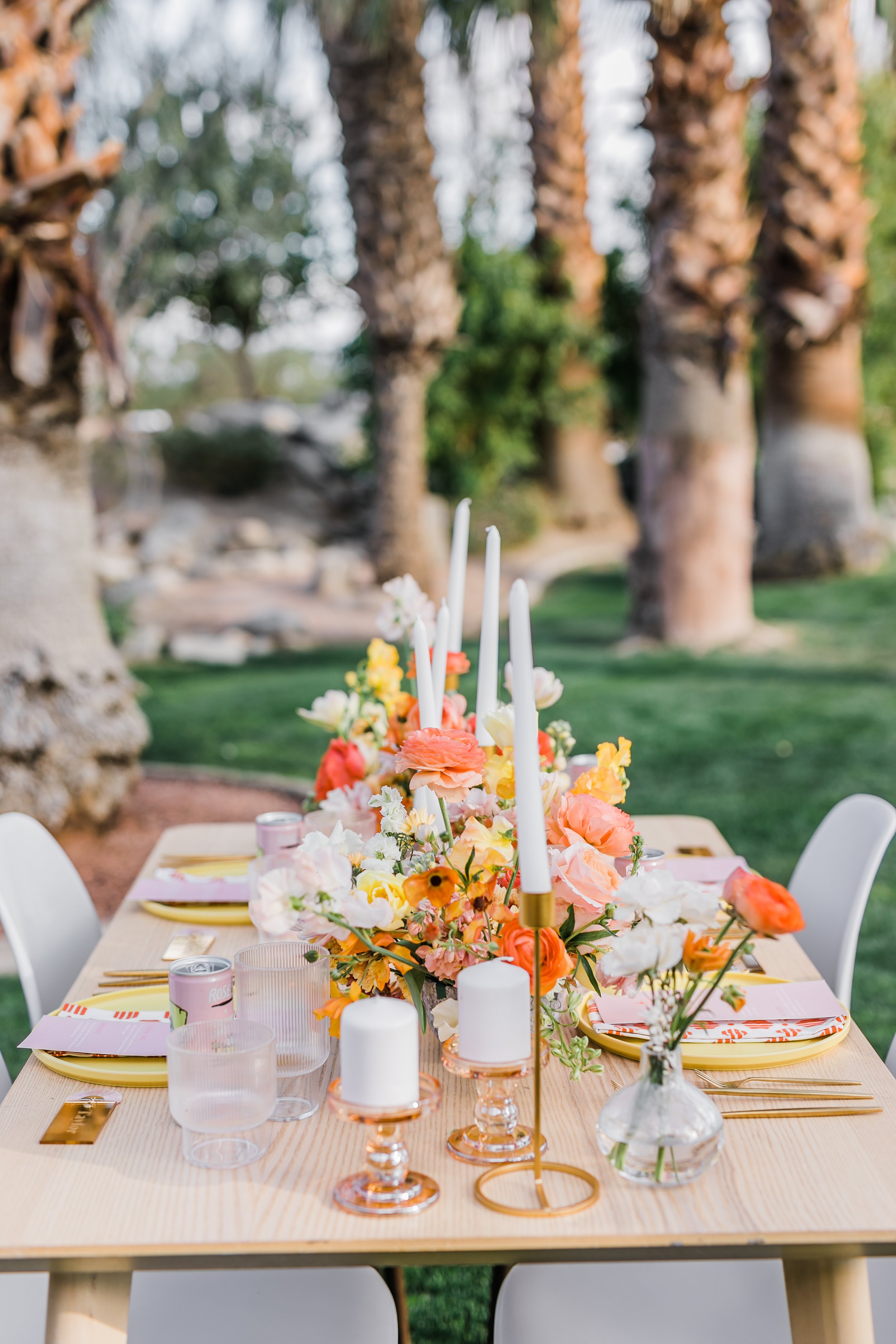 Retro, bright, sunny, reception table scape at Palm Springs wedding location Bougainvillea Estate.