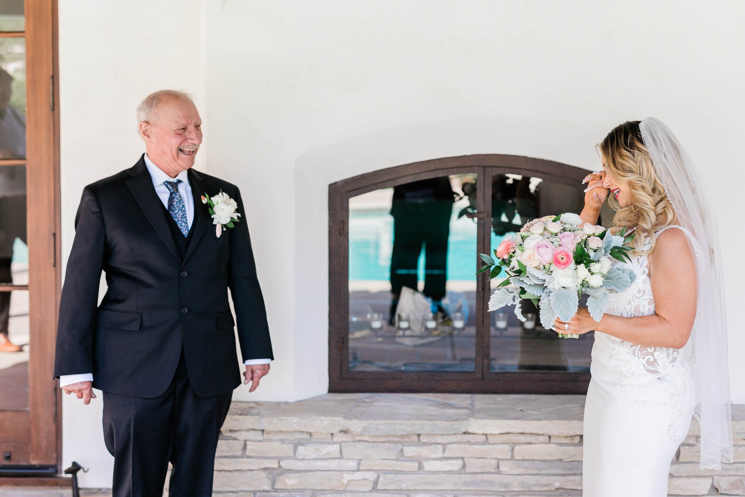 First look with father of the bride at Spanish style ranch house at Quail Ranch events wedding venue in Simi Valley