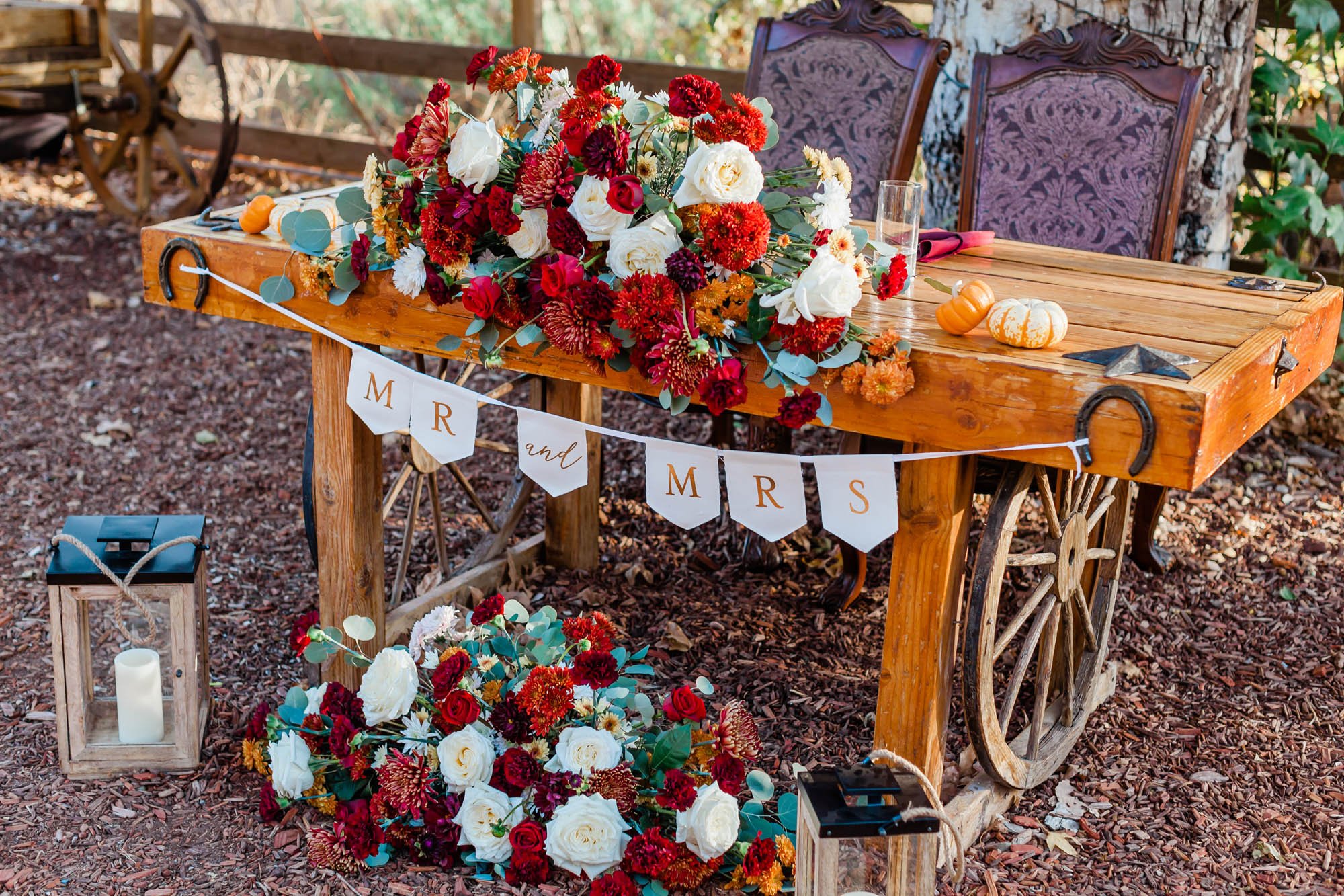 fall ranch wedding with pumpkins reception at reptacular ranch 