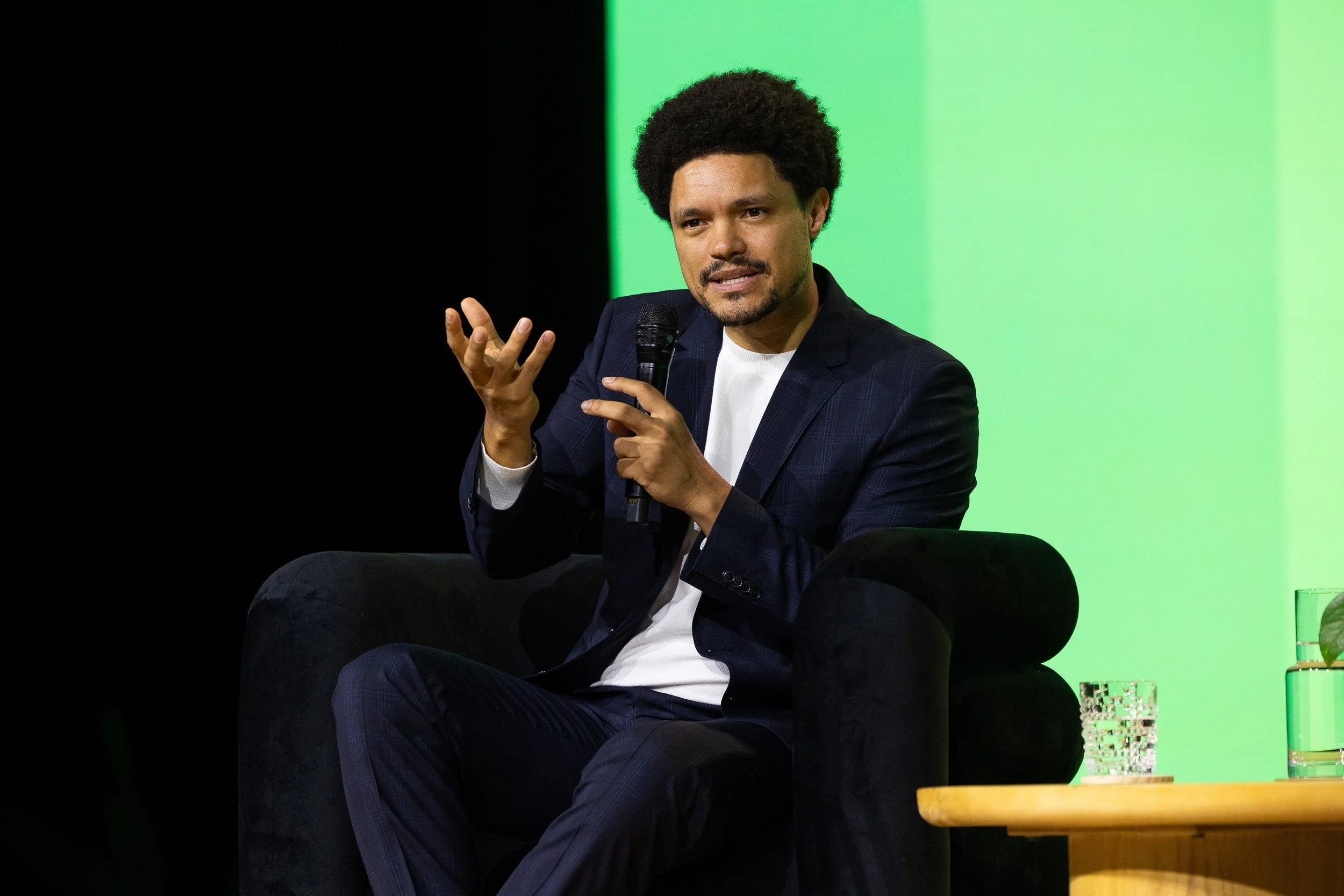 Corporate event photography of Trevor Noah speaking at the Zendesk Relate conference