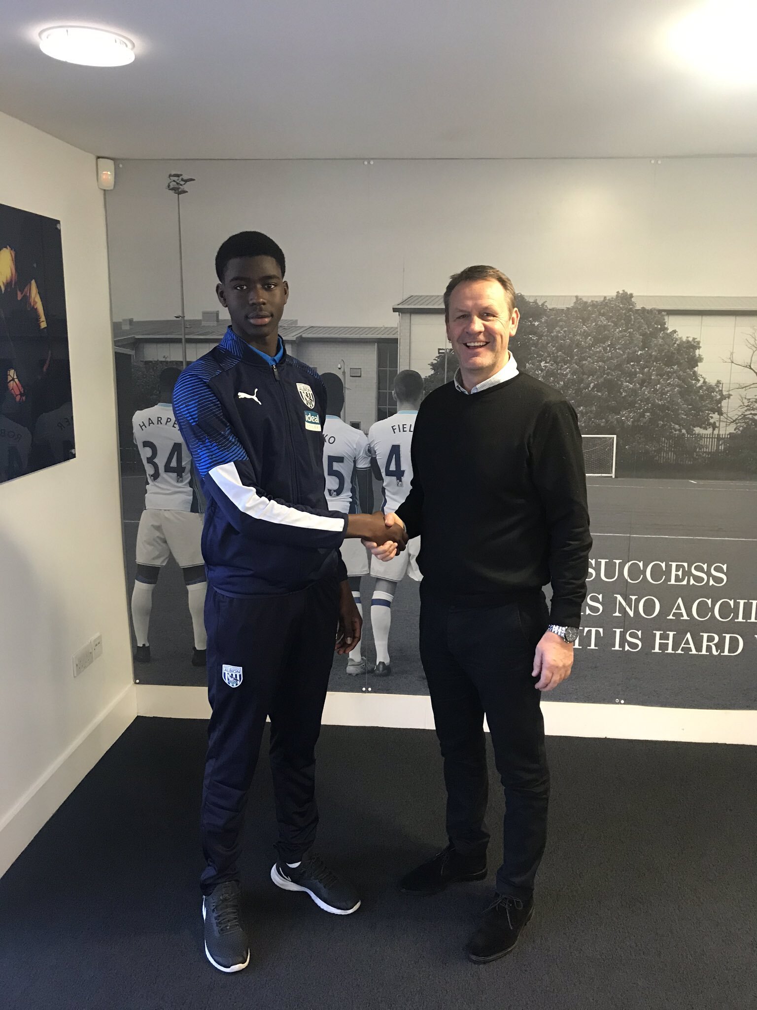 West Bromwich Albion signing Modou Faal with Steve Hopcroft - former top talent spotter at the Hawthorns