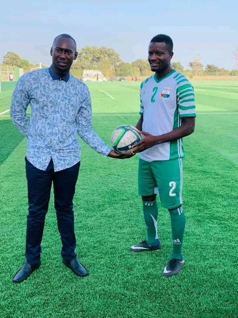 Division one top marksman Saikouba Ceesay being awarded Man-of-the-Match ball against Brikama Utd at the weekend