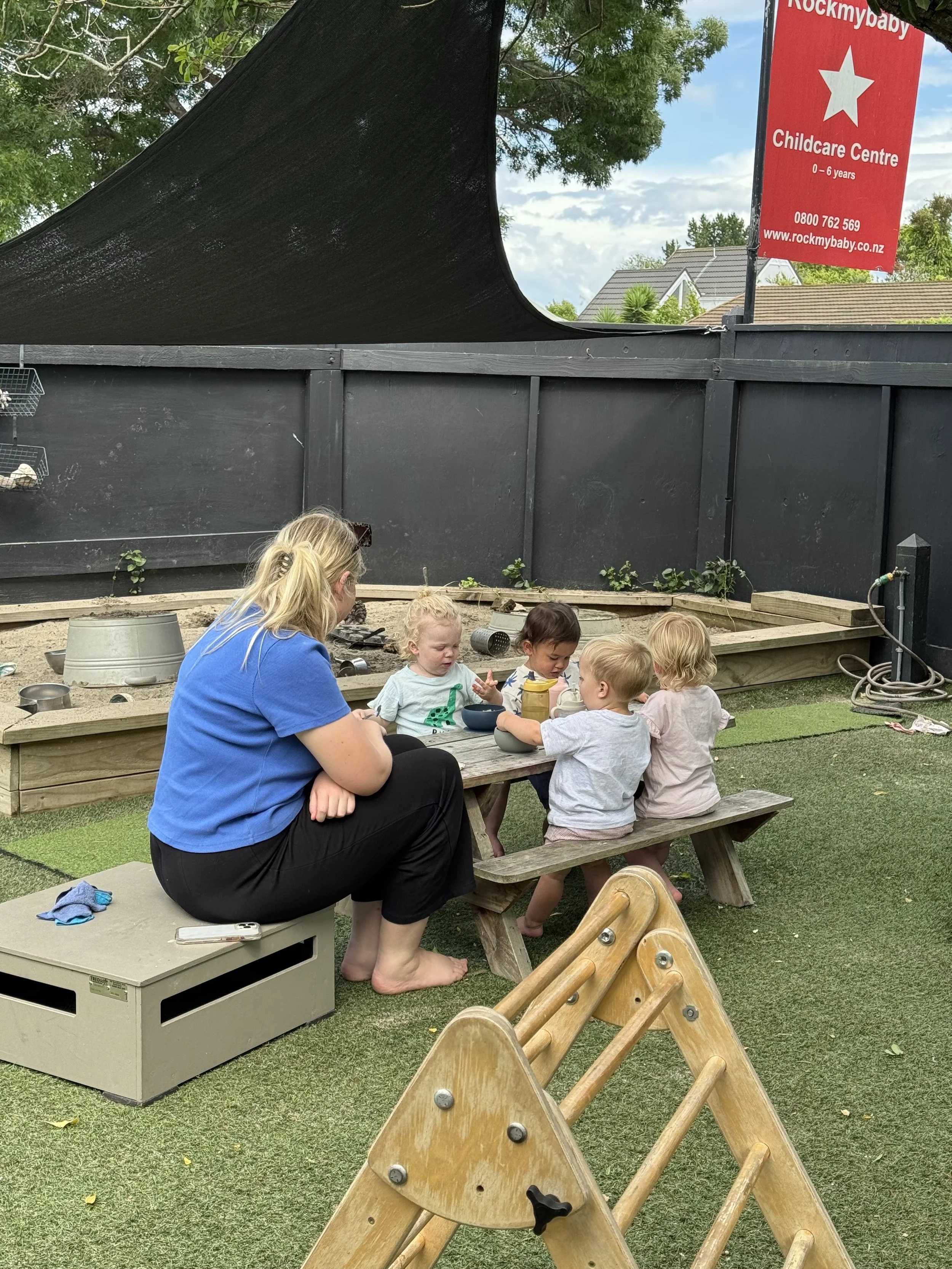 Tamariki enjoying lunch in the Rockmybaby Childcare dining area