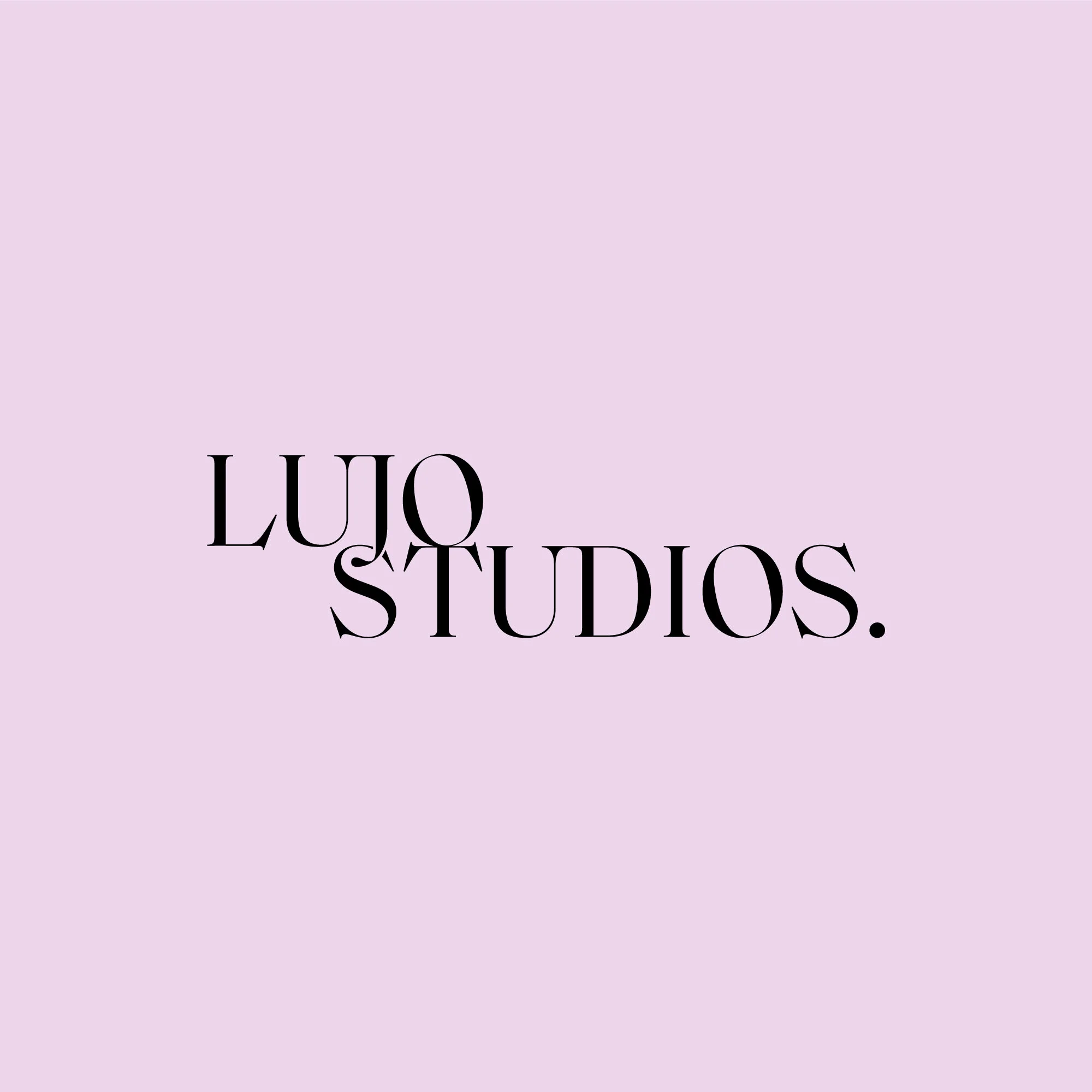 Lujo Studios logo in black on bright pale purple background