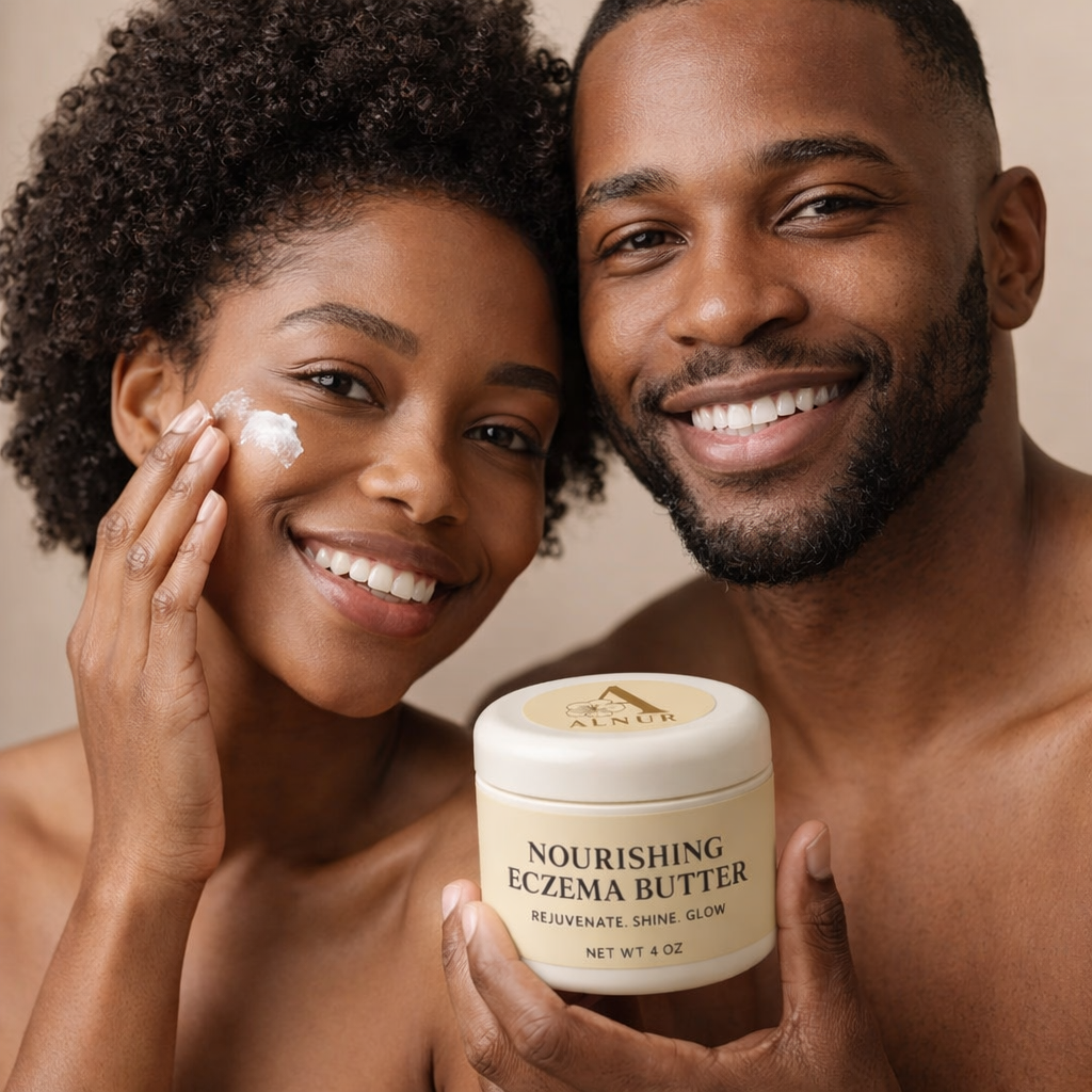 A smiling Black woman applies eczema butter to her face while a smiling Black man holds a jar of nourishing eczema butter beside her, both appearing happy and confident.