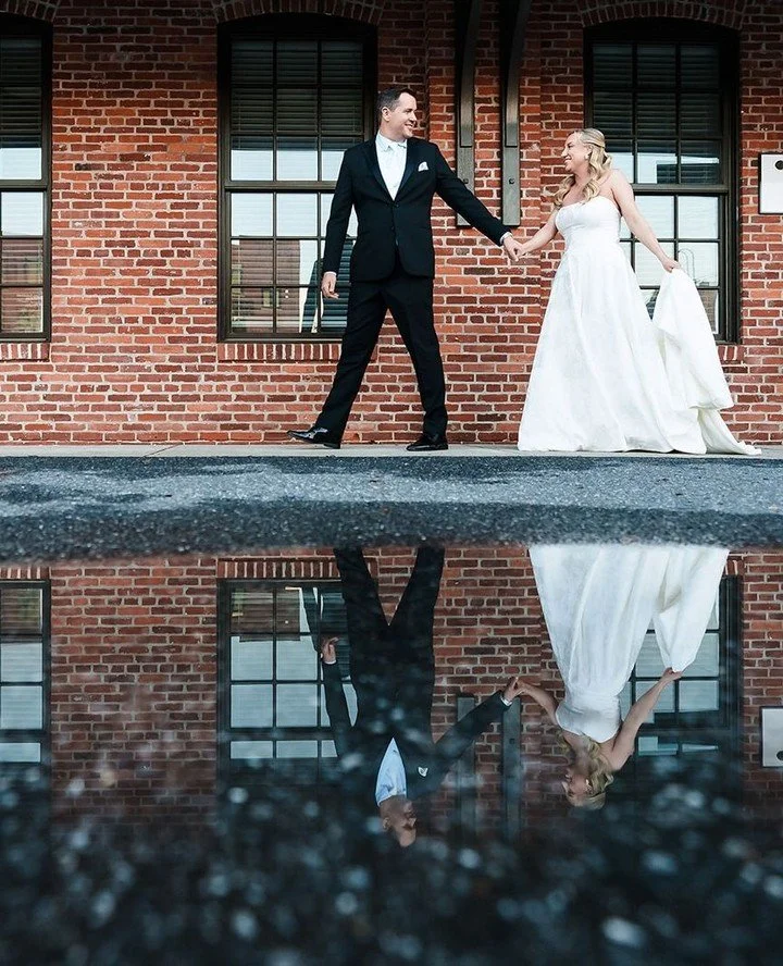 A quiet, timeless moment captured in reflection where historic brick, soft light, and every step forward leads into forever, creating the kind of wedding day you&rsquo;ll never want to end. ✨️⁠
⁠
📸@smjphoto