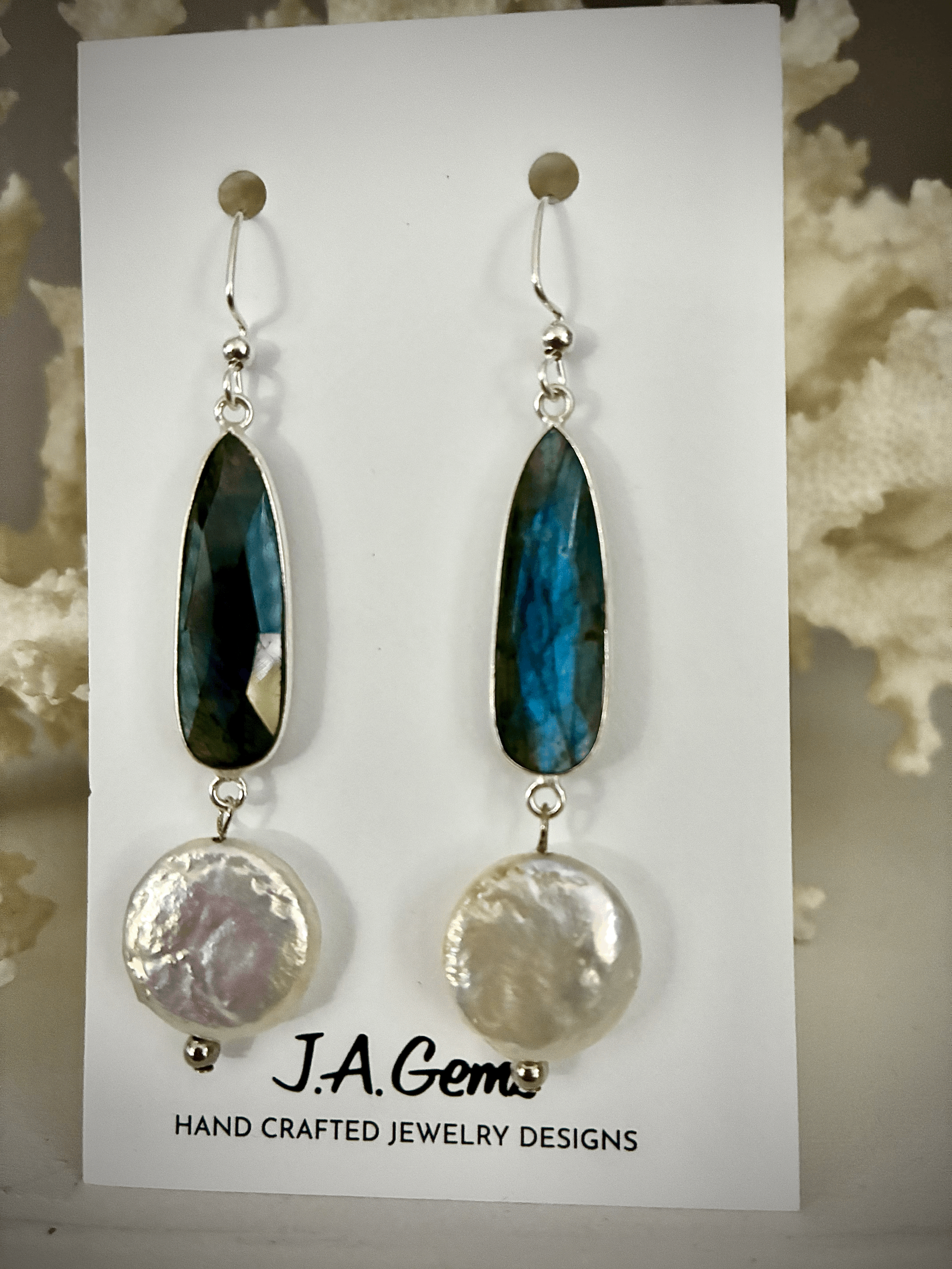 Beautiful Blue Fire Labradorite and Mother of Pearl accented in Silver