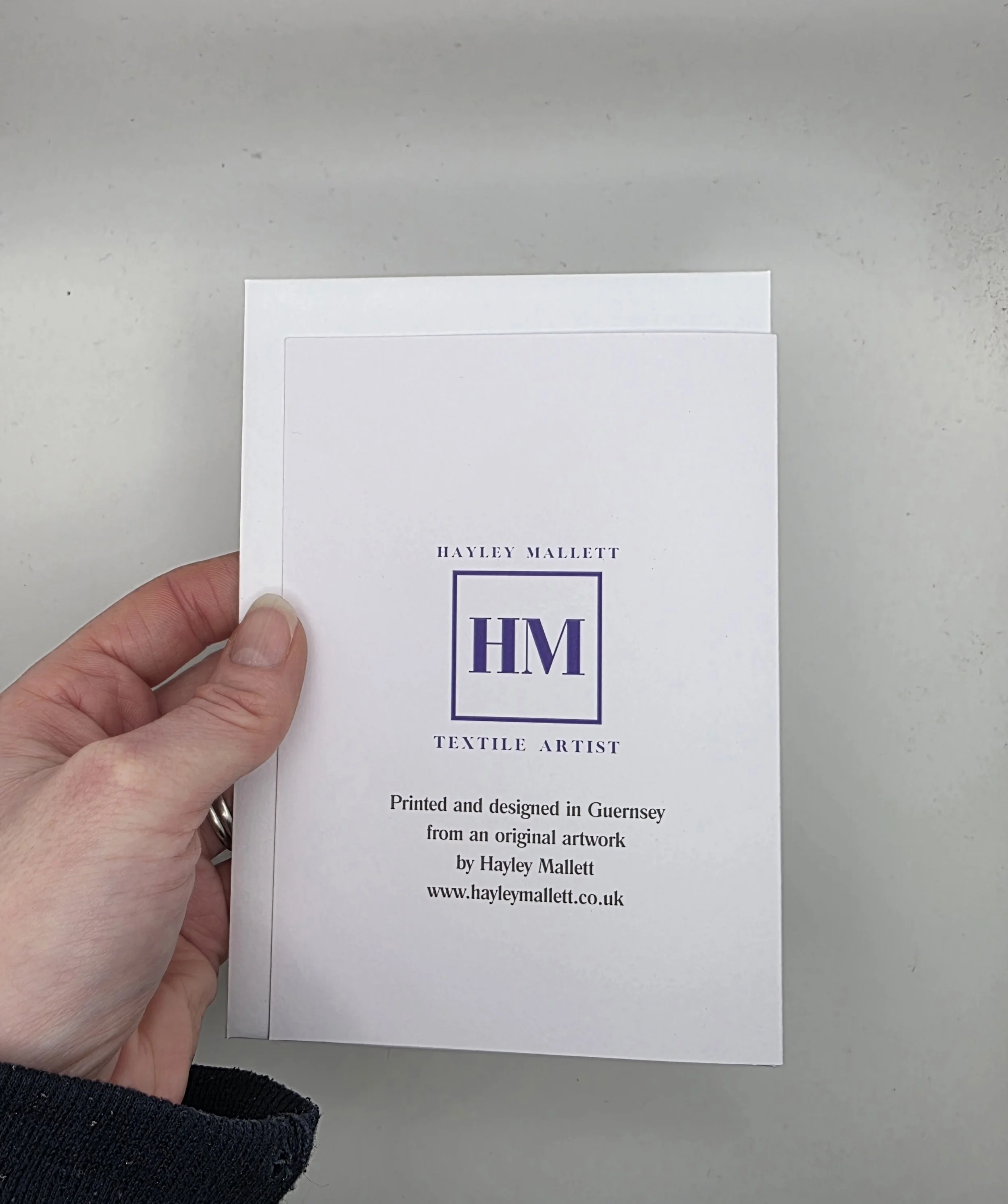 Back of floral A6 Mother’s Day card, featuring Hayley Mallett logo and Guernsey-made details.