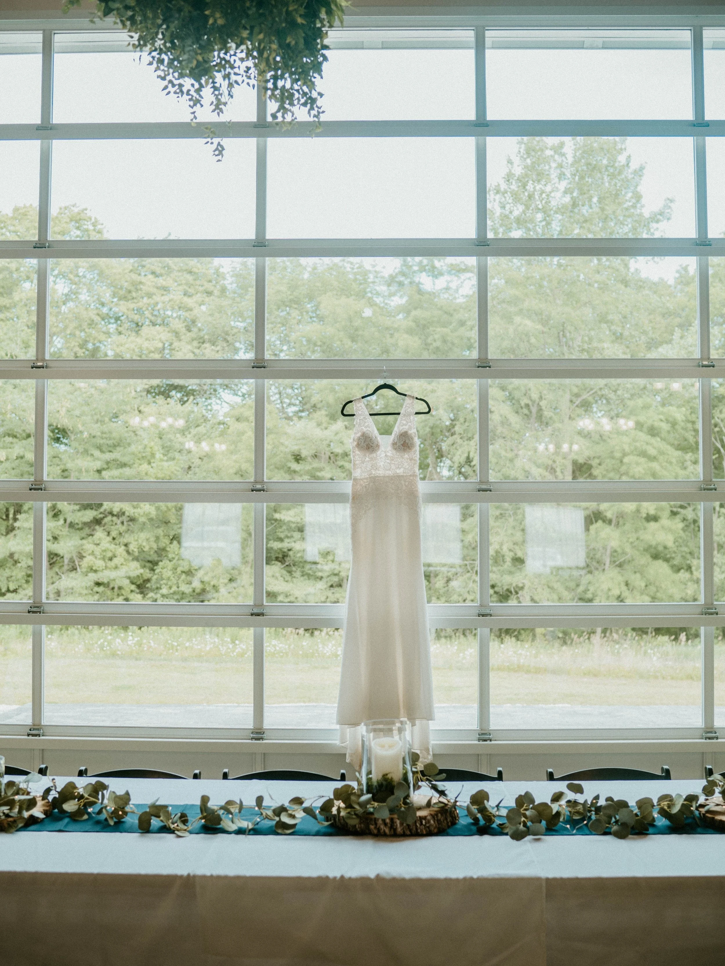 One of my favorite features as our venue coordinator is our glass garage door. This door allows for so much natural light making for the perfect photos and also the versatility of being able to open the garage door to utilize both the patio space and