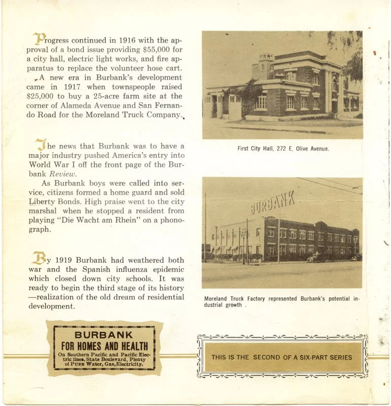 Photograph of the First City Hall building at 272 E. Olive Avenue, showing a historic two-story structure with architectural details, located on a street corner.