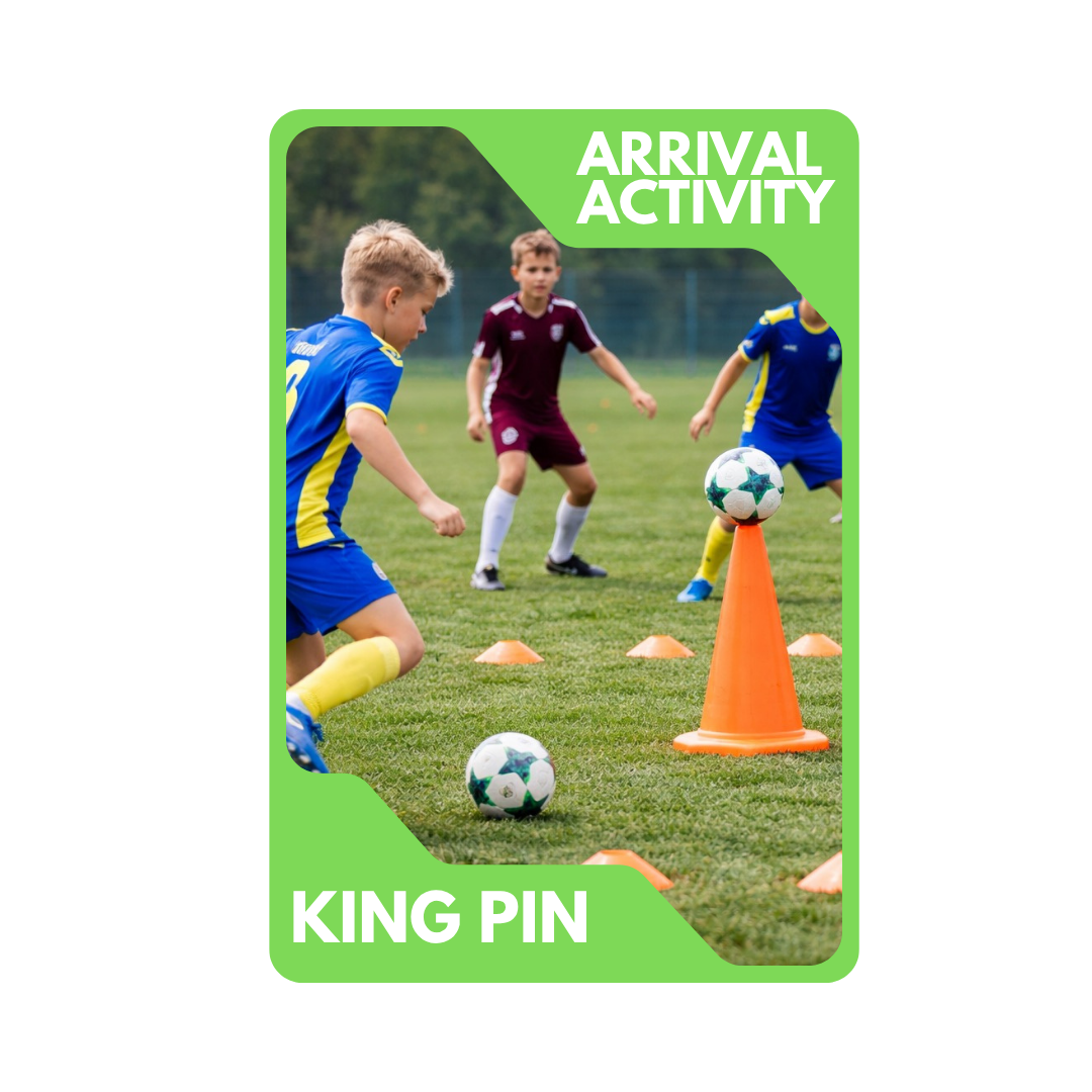 Kids playing soccer during an arrival activity, with cones and soccer balls on a grassy field.