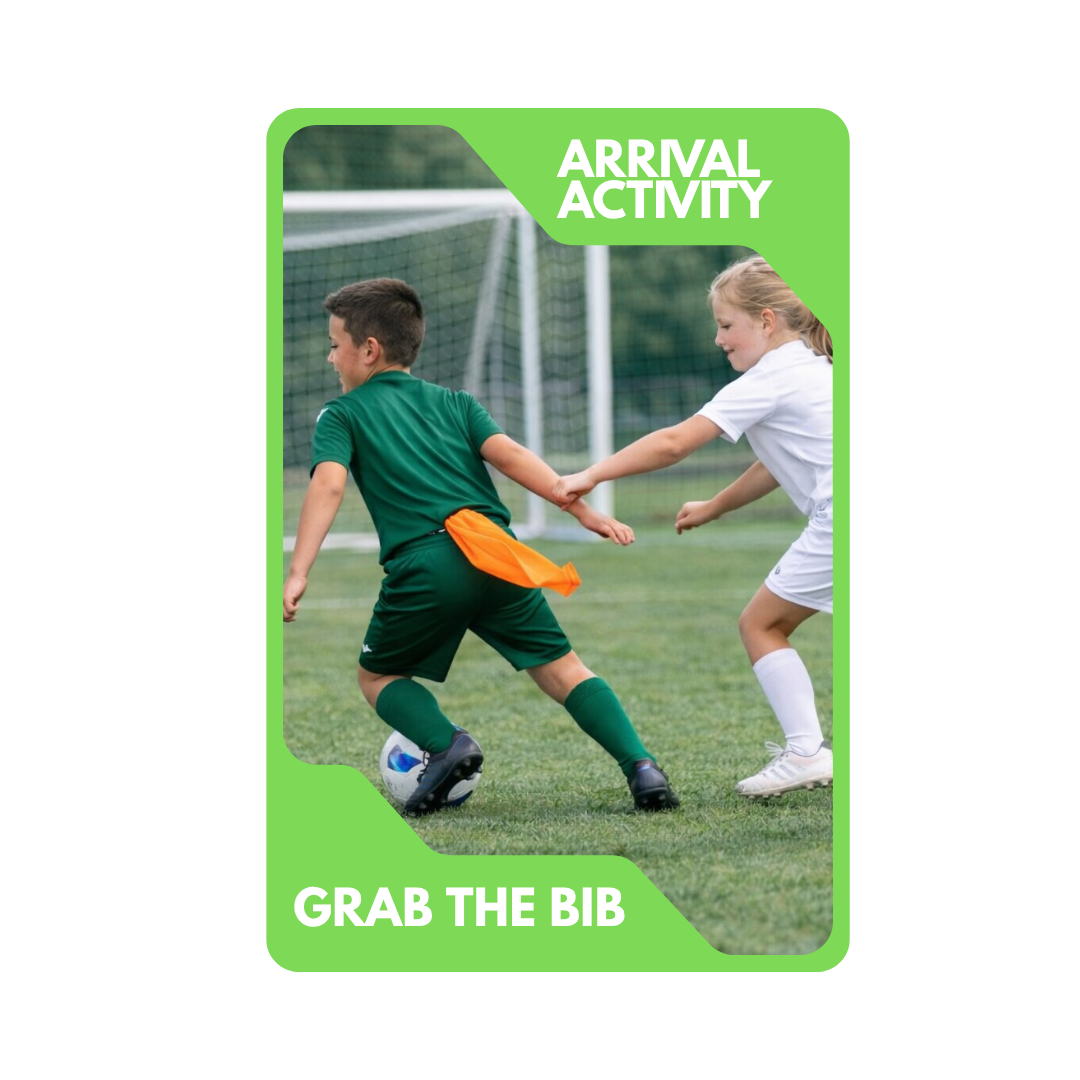 Two children playing soccer on a field, with one child in a green jersey and the other in white, holding hands during an arrival activity titled 'Grab the Bib'.