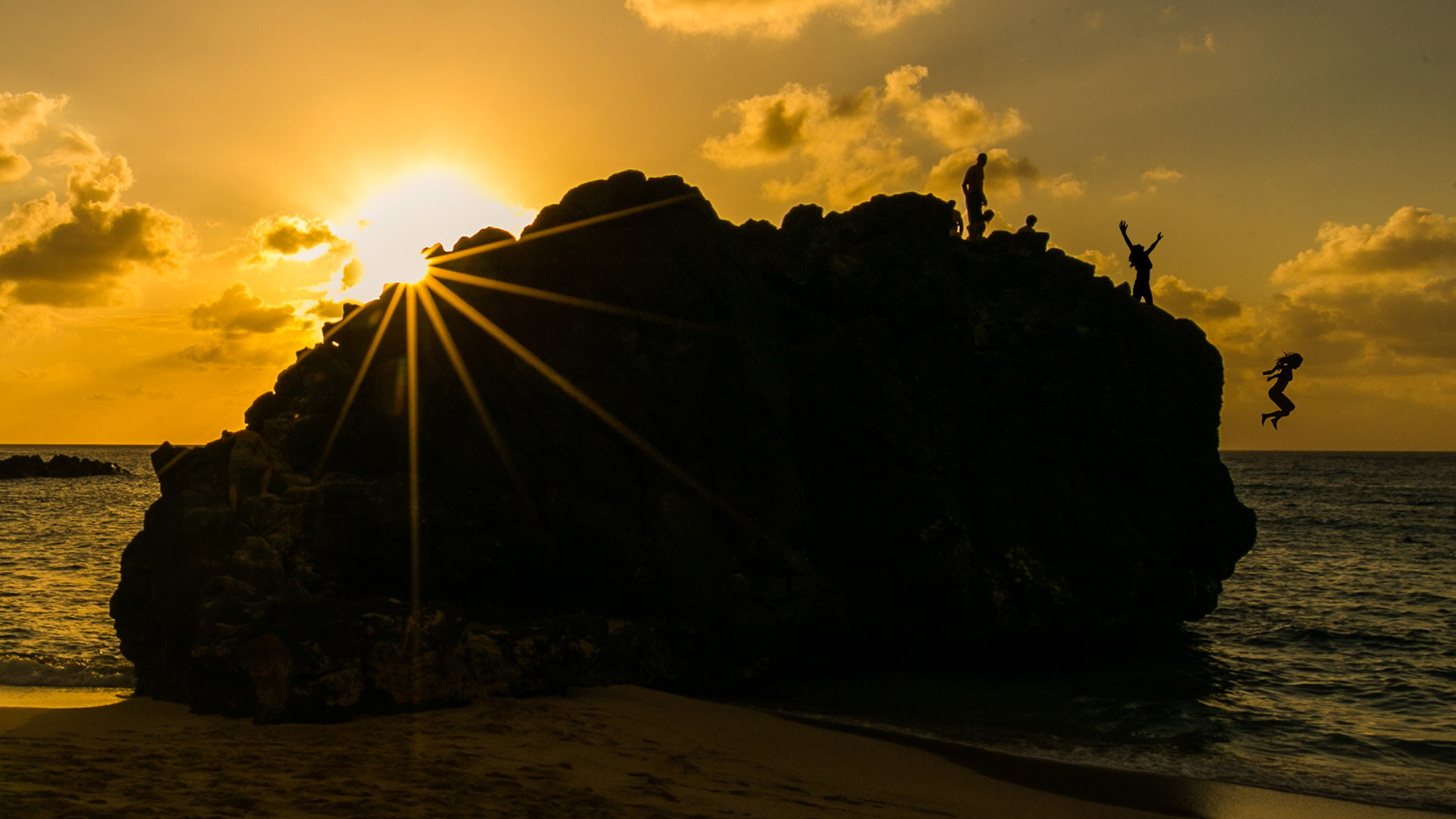 Waimea Bay Sunset Rock Jump.jpg