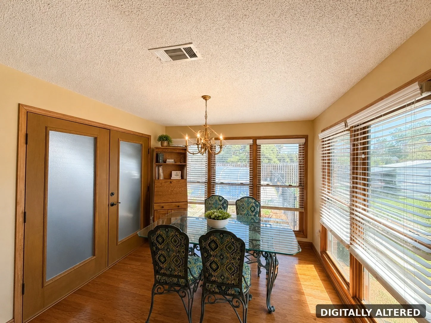 sunlit_glass_top_dining_nook_digitally_altered.jpg