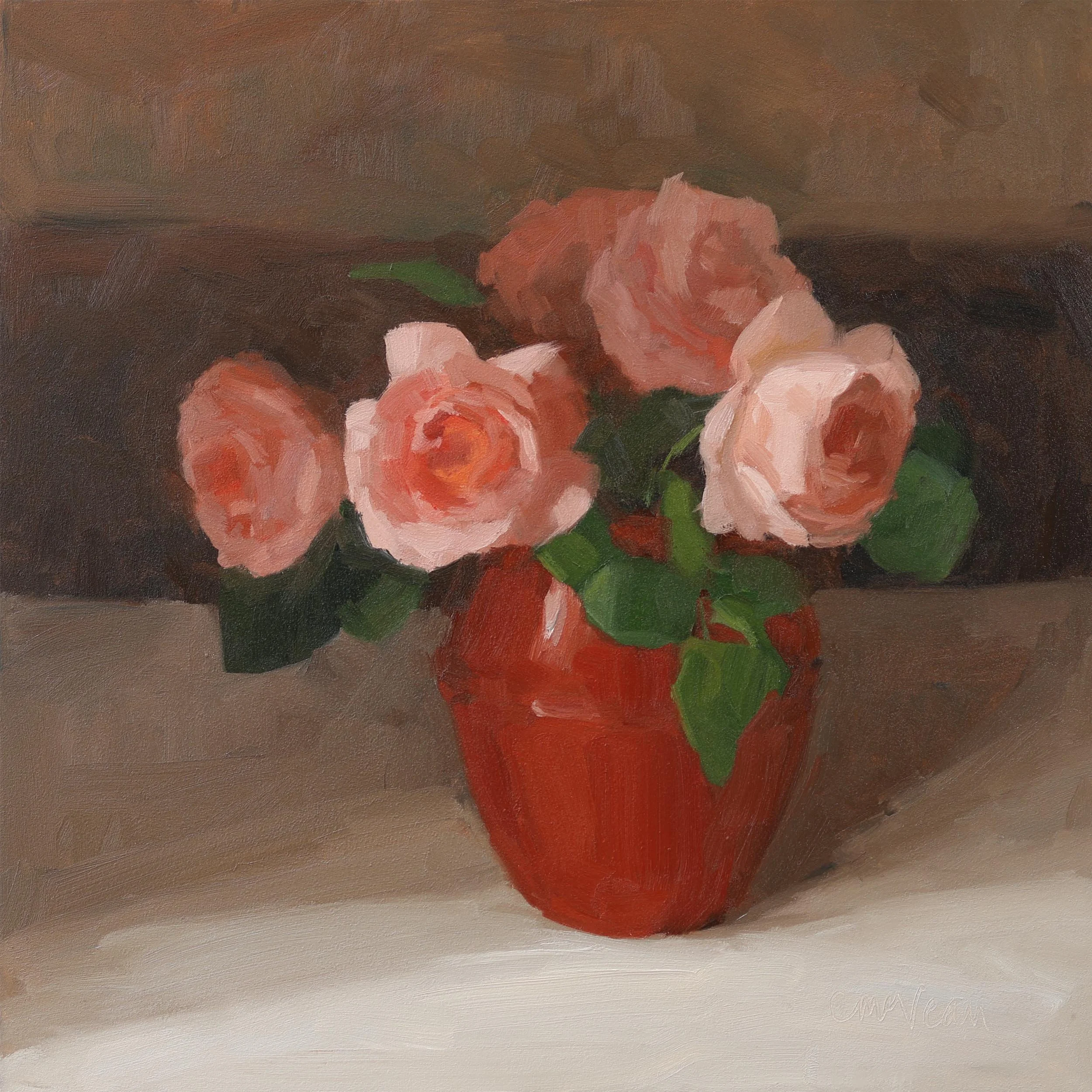 Roses in the red enamel pot
