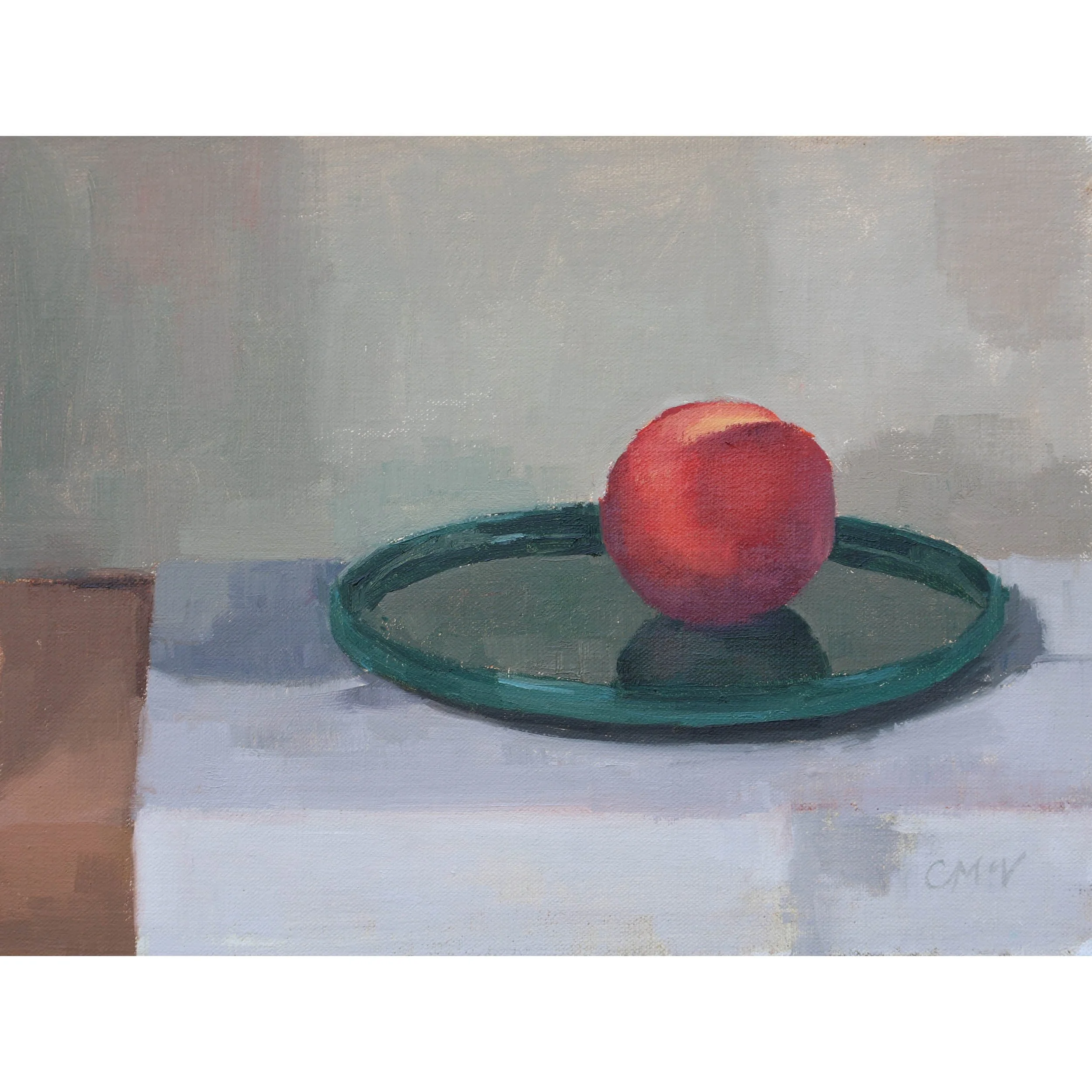Painting of a peach on a glazed green plate