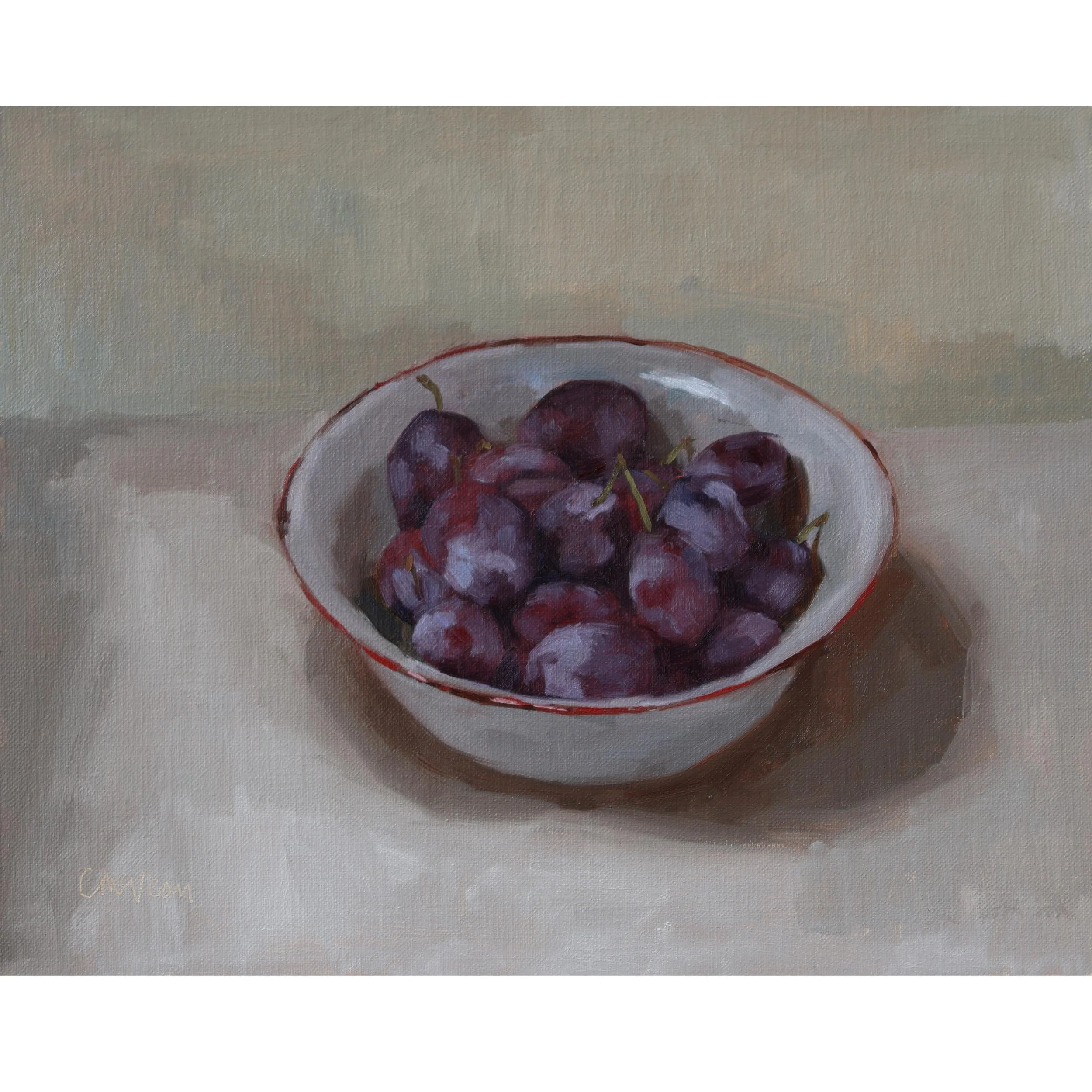 September plums in an old enamel bowl