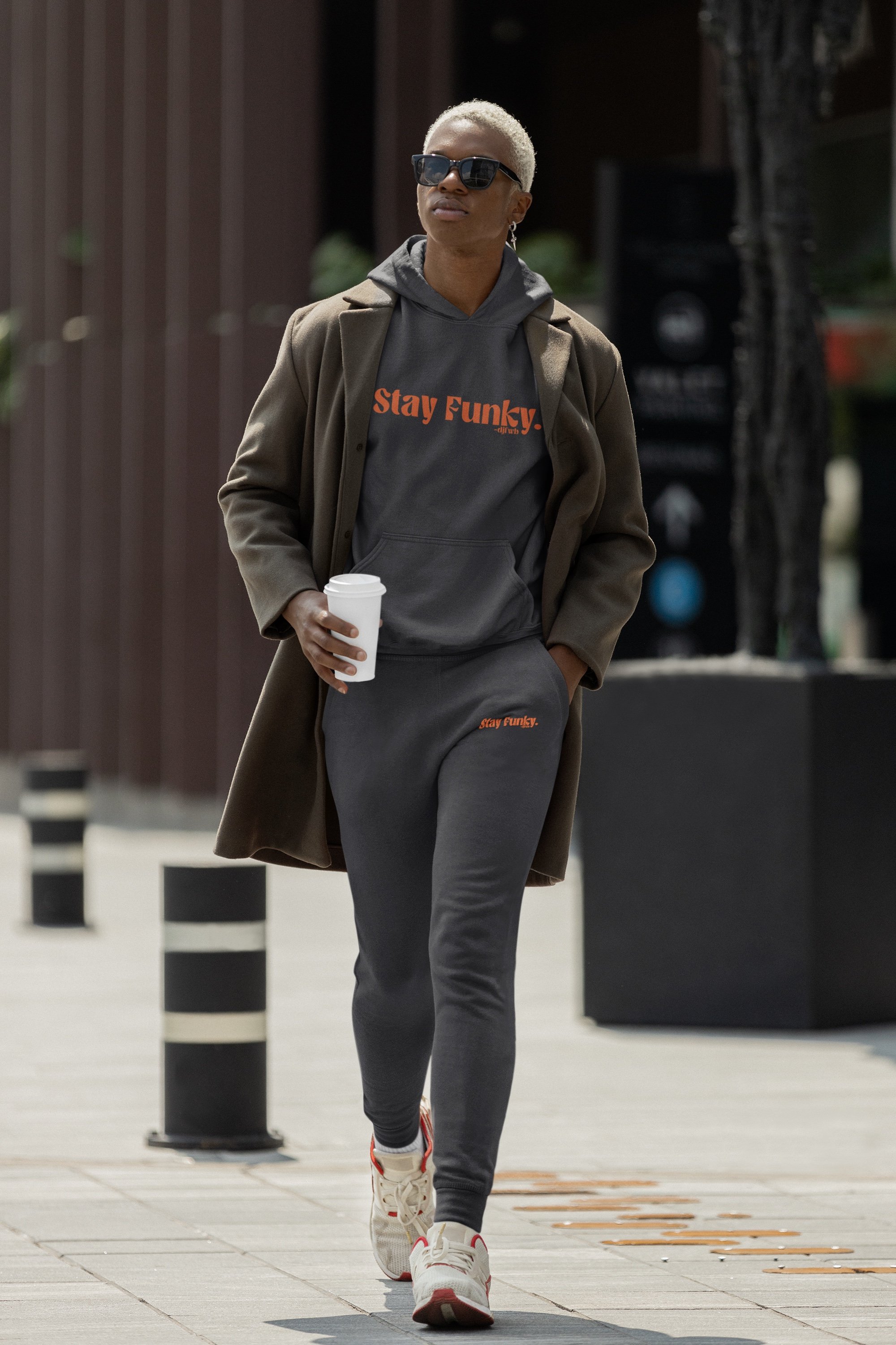 Secret Stash 2027 Hoodie | After Hours, Charcoal: model wearing the full matching hoodie and sweatpants set