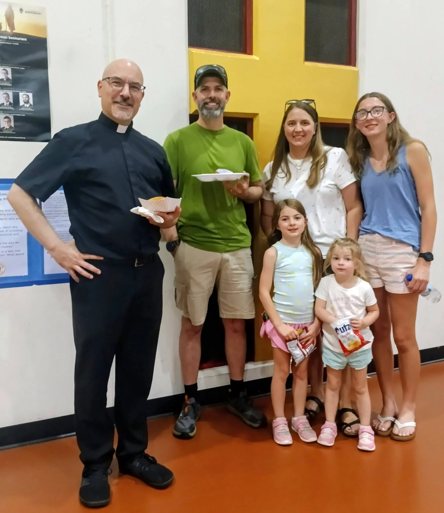 Fr Marcoe with Parry Family.jpg