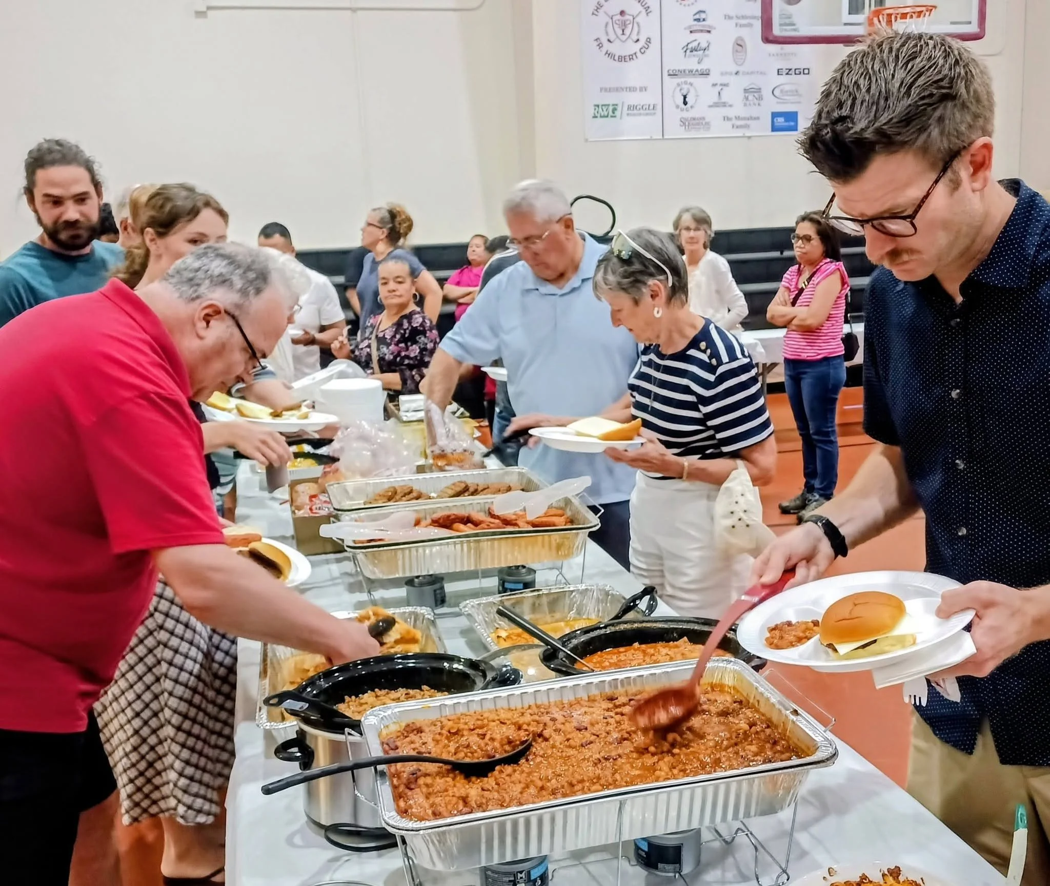 Attendees at buffet table.jpg