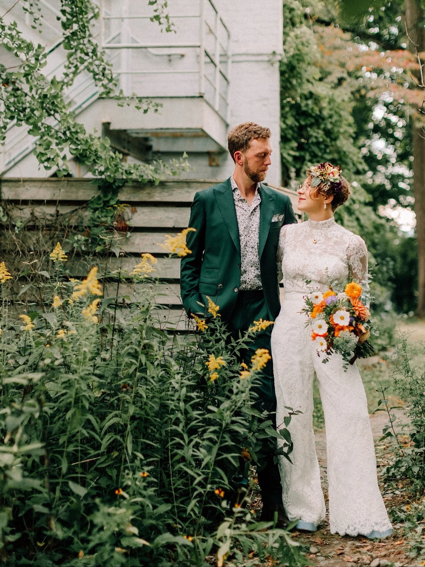 L I L Y | #realloulettebride Garden party goals 💐 Lily and Luke brought the magic! Lily&rsquo;s custom backless jumpsuit crafted in our French floral re-embroidered lace with detachable sleeves was the perfect mix of romantic and dance-floor-ready. 