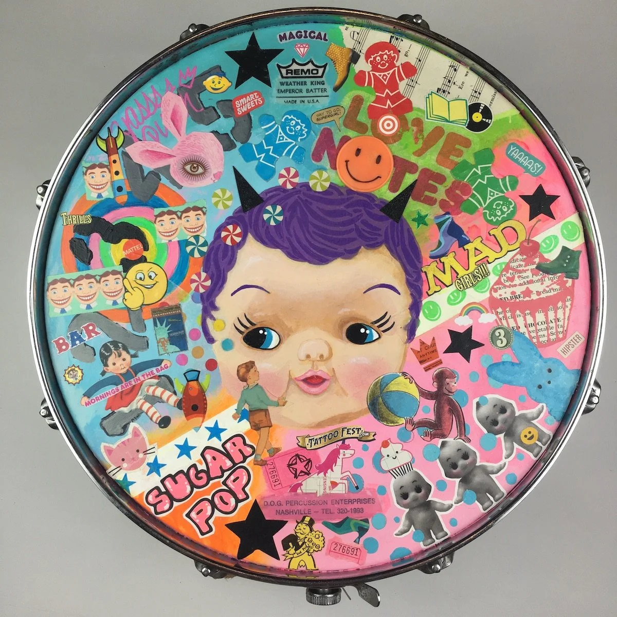 Mixed media painted drum by Michelle Renee Bernard. Acrylic and collage on upcylcled drum. Baby doll. Marching to the beat of my own drum. Little Drummer Girl