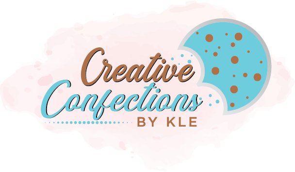 Logo for 'Creative Confections by KLE' featuring pink watercolor background with light blue cookie illustration and brown and blue script text.