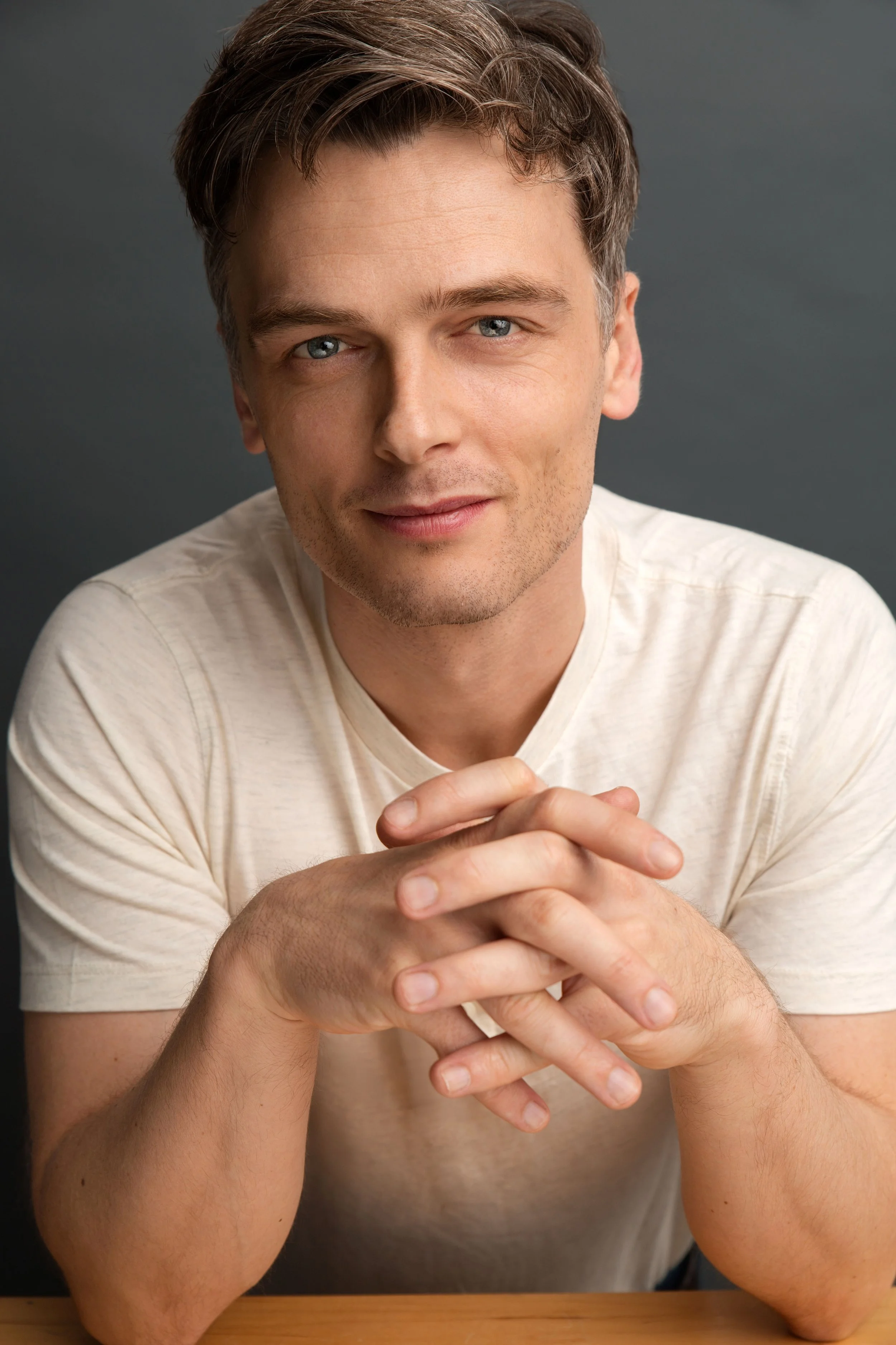 Personal branding photographer in Vancouver capturing a professional studio portrait.
