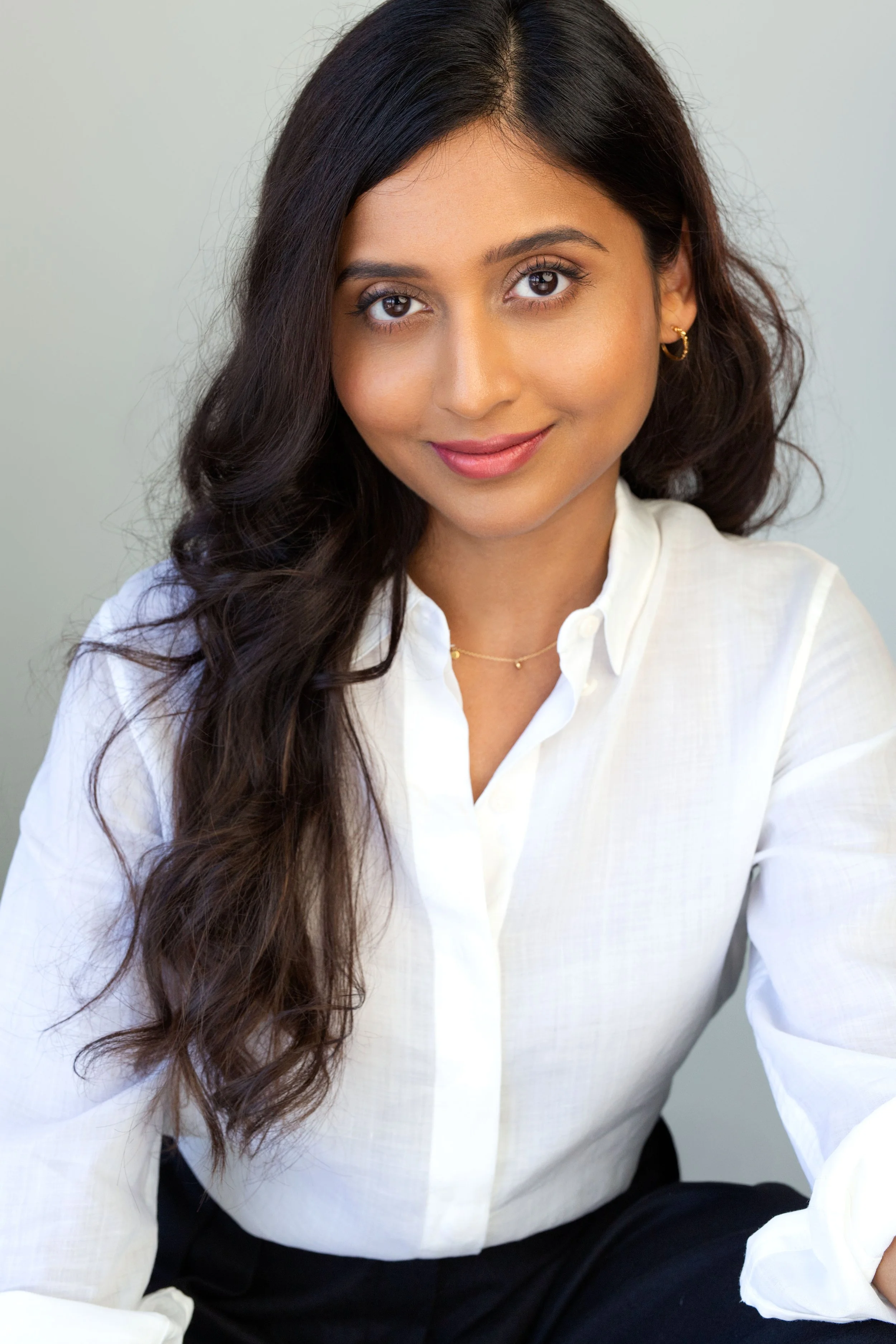 Professional women’s headshot in Vancouver taken by a photographer in studio. 