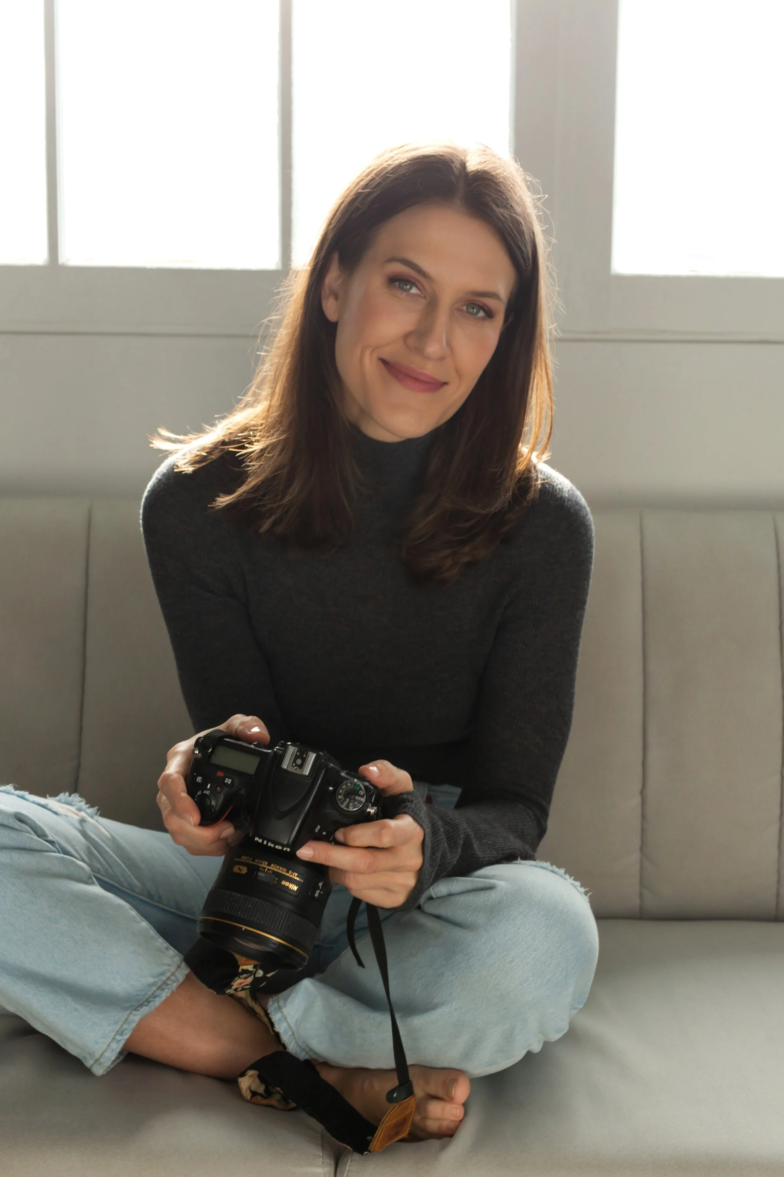 Alison Wandzura, Vancouver headshot and personal branding photographer, in her Vancouver portrait studio.