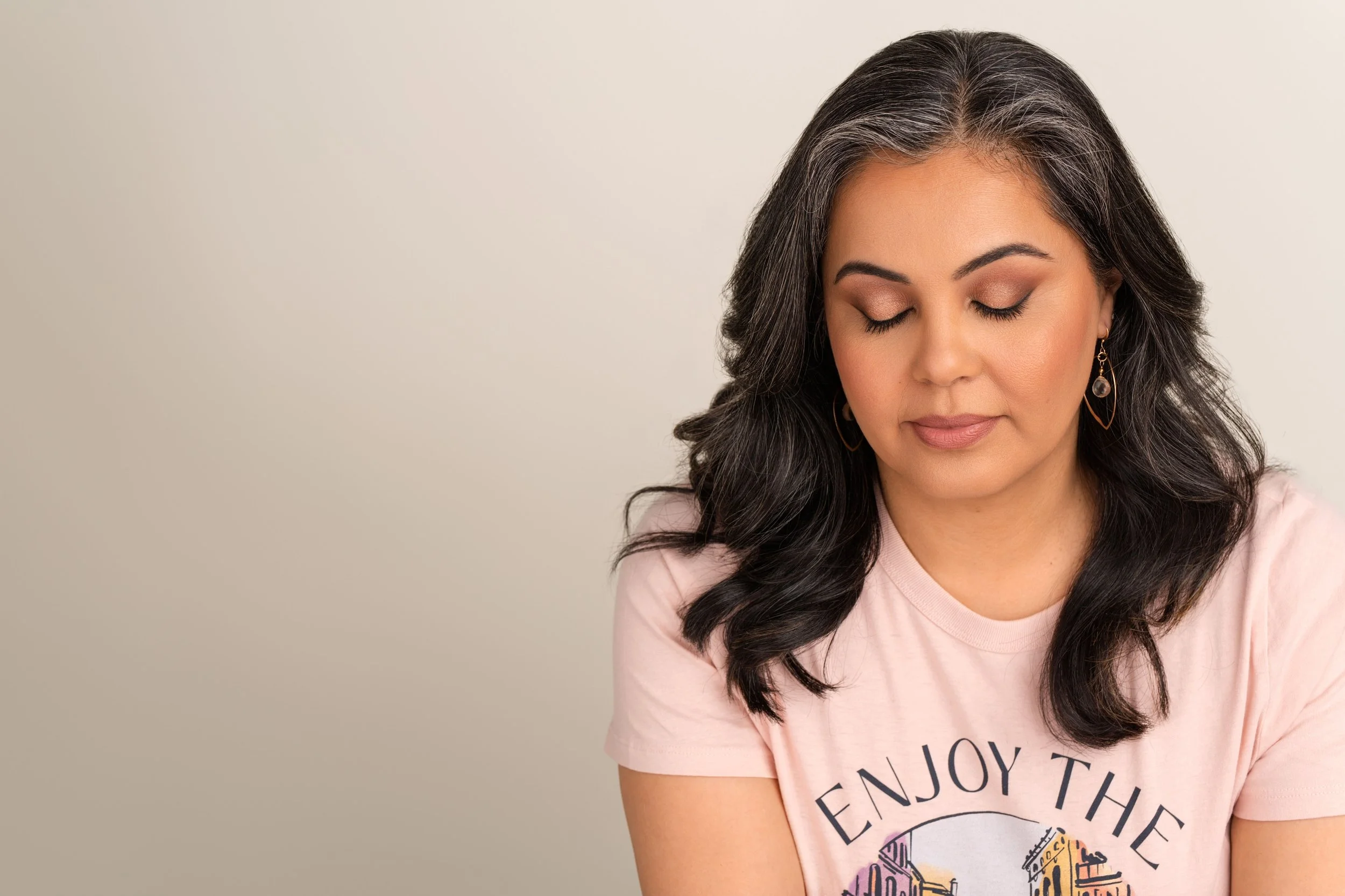 Professional woman captured during a modern portrait session in a Vancouver studio.